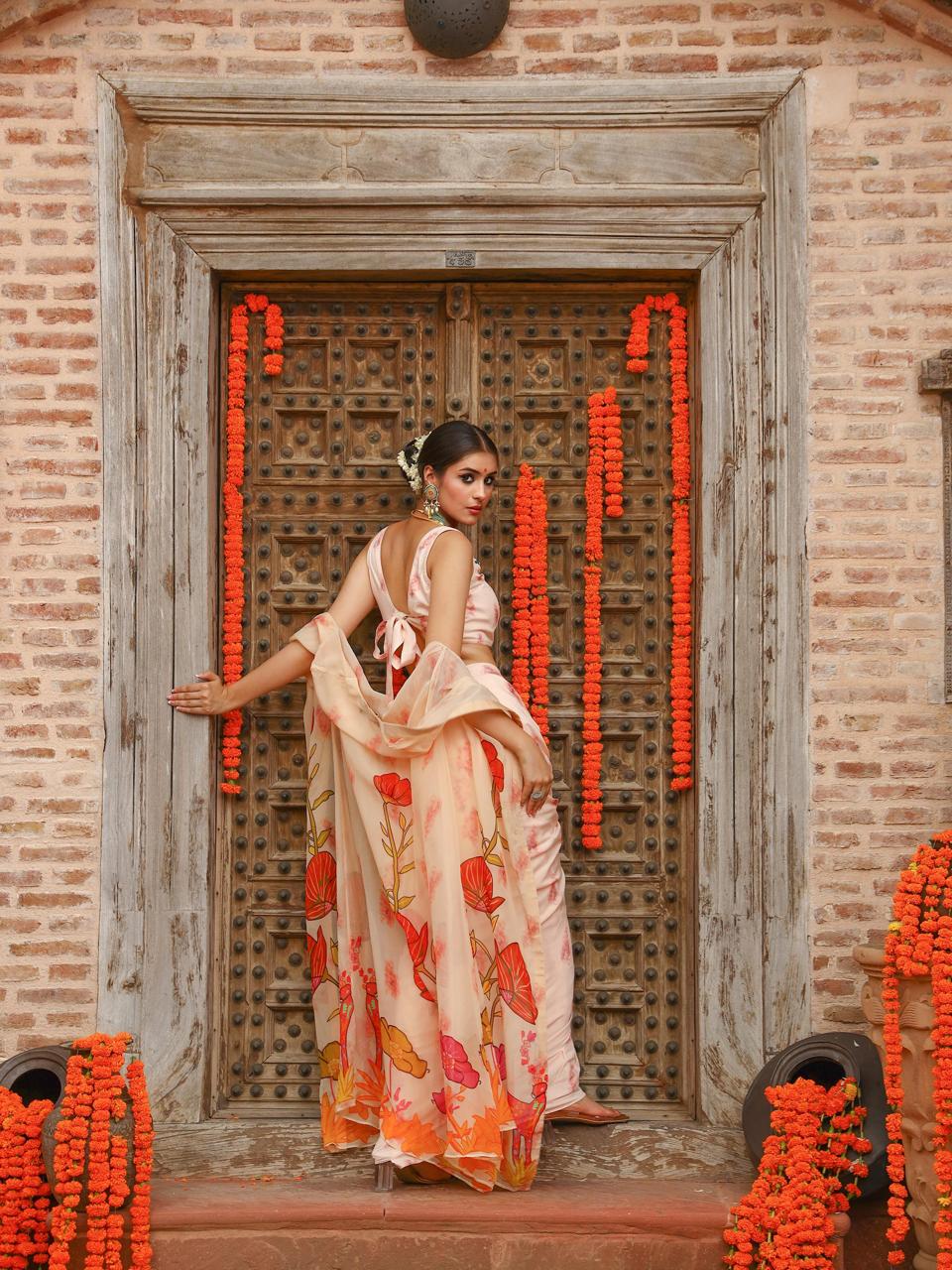 A model showcasing Levi Cape Skirt Set by Miku Kumar from Miku Kumar's collection