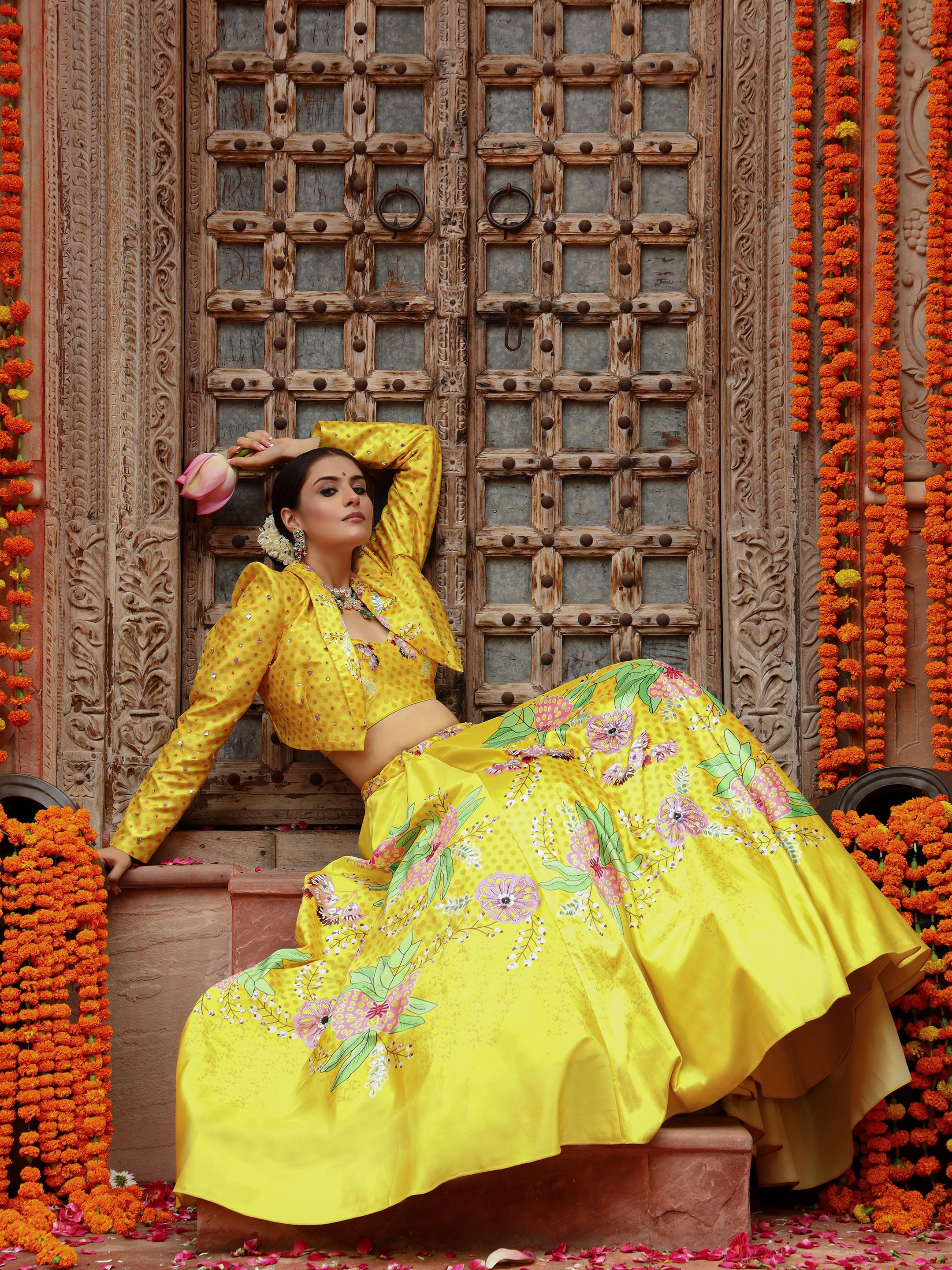 A model showcasing Roma Jacket Lehenga Set by Miku Kumar from Miku Kumar's collection