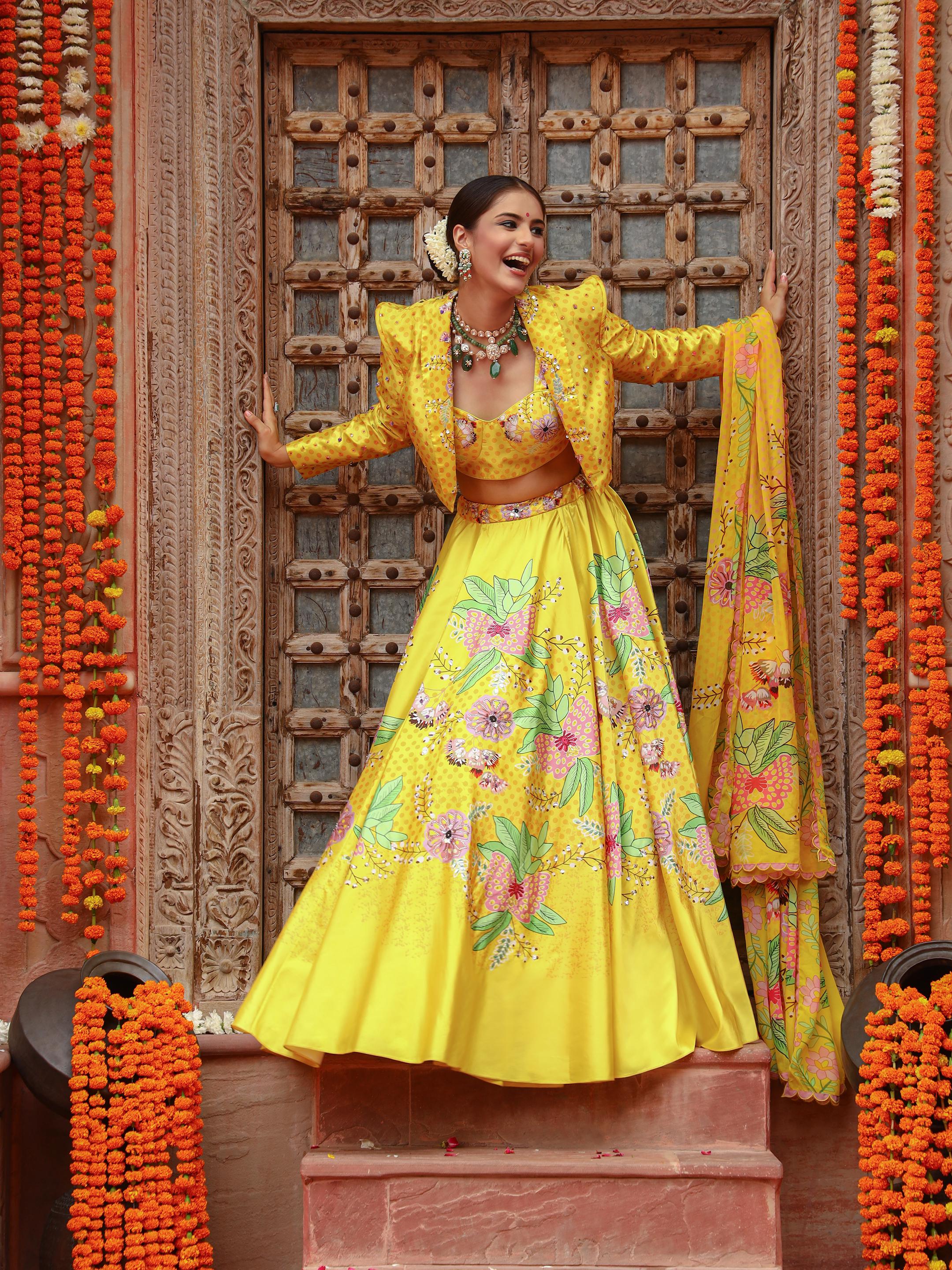 A model showcasing Roma Jacket Lehenga Set by Miku Kumar from Miku Kumar's collection