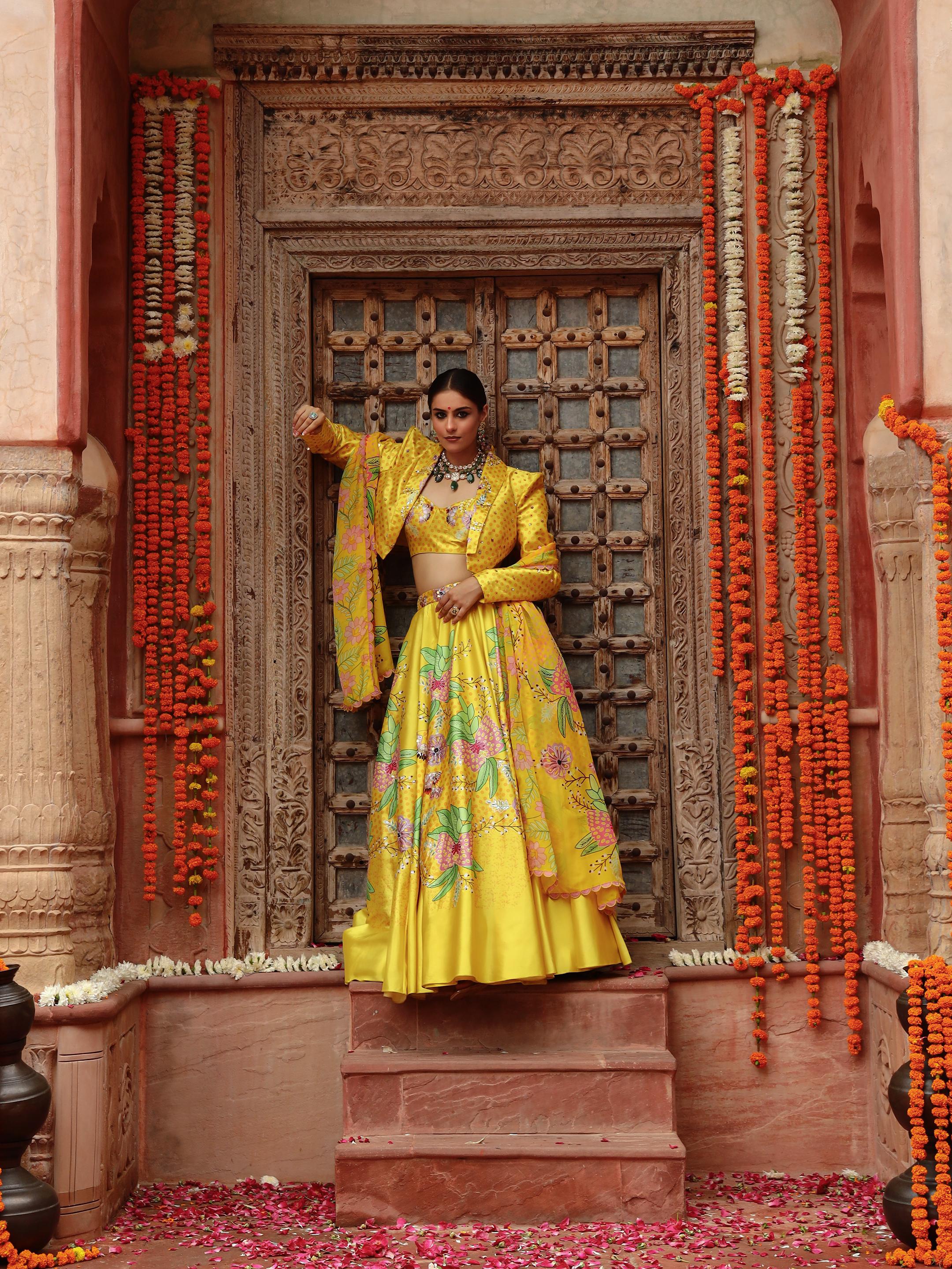A model showcasing Roma Jacket Lehenga Set by Miku Kumar from Miku Kumar's collection