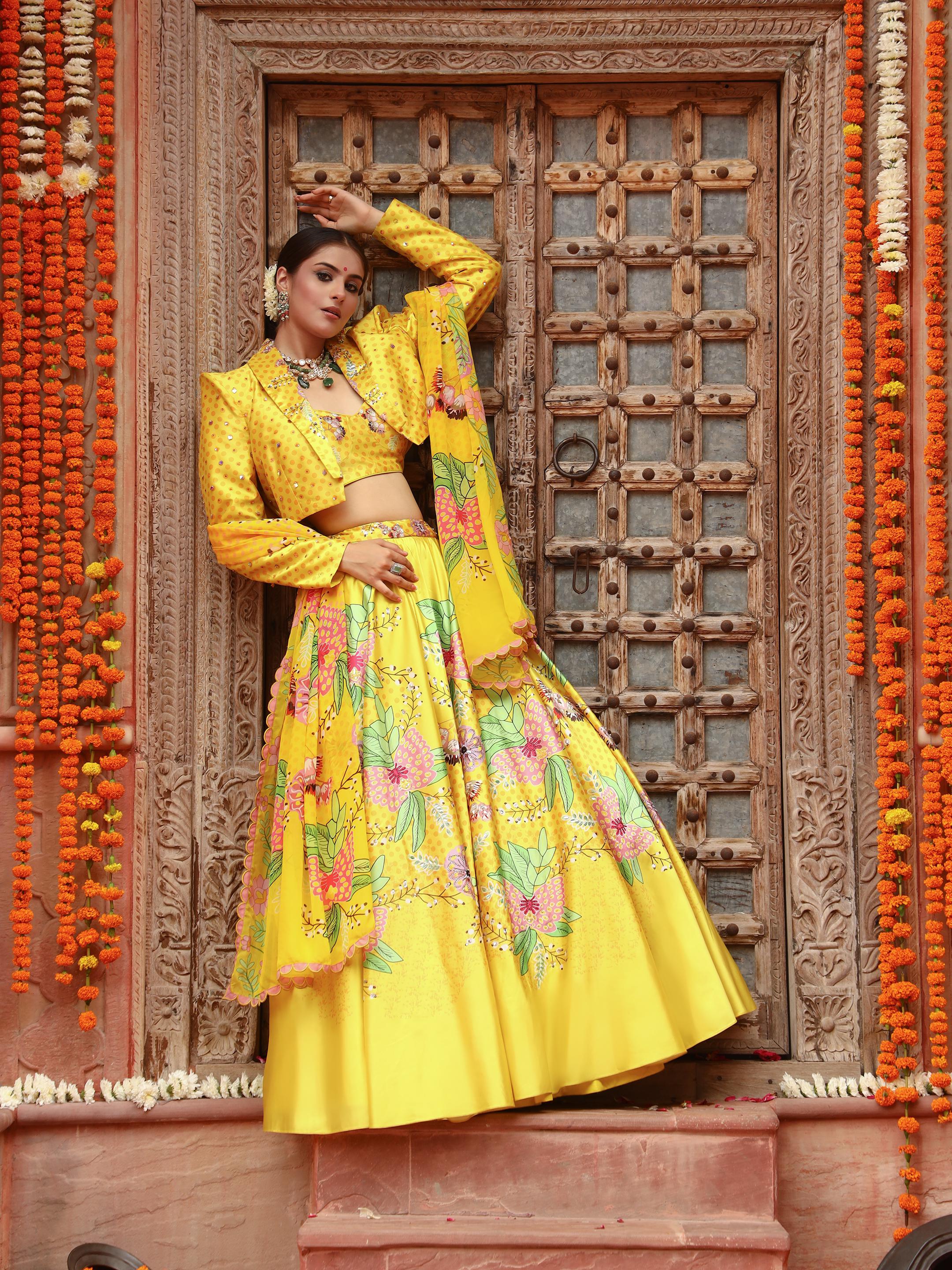 A model showcasing Roma Jacket Lehenga Set by Miku Kumar from Miku Kumar's collection