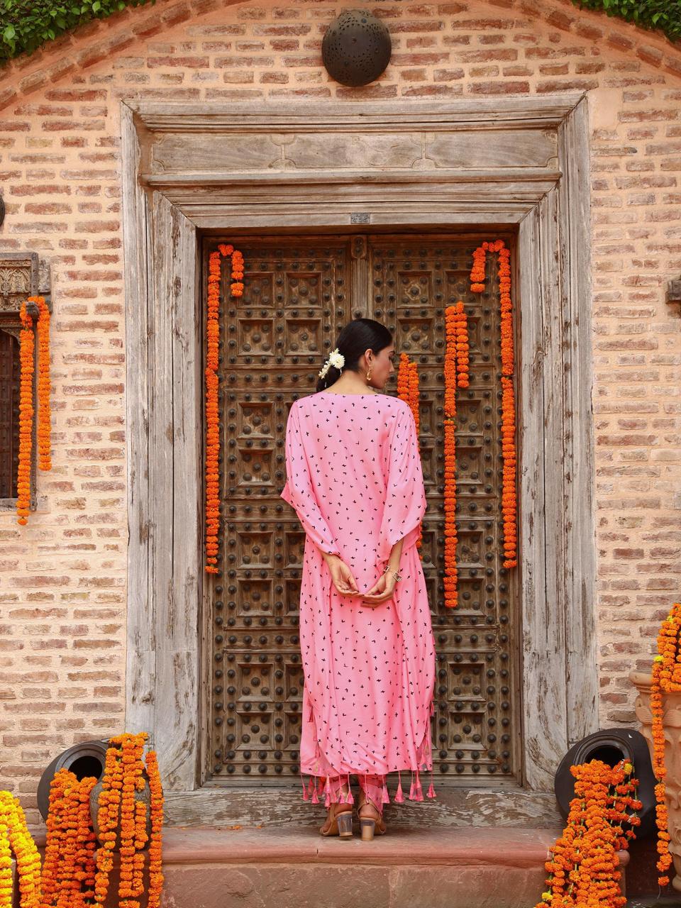 A model showcasing Eta Kaftan Set by Miku Kumar from Miku Kumar's collection