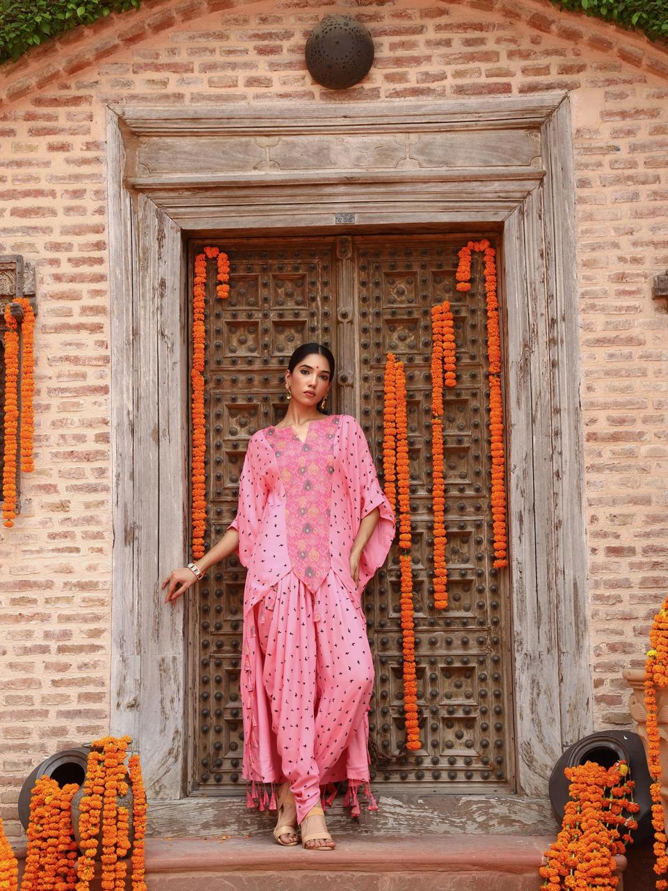 A model showcasing Eta Kaftan Set by Miku Kumar from Miku Kumar's collection
