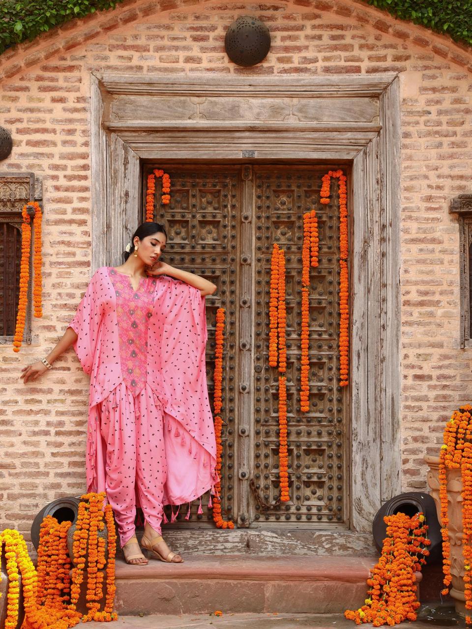 A model showcasing Eta Kaftan Set by Miku Kumar from Miku Kumar's collection