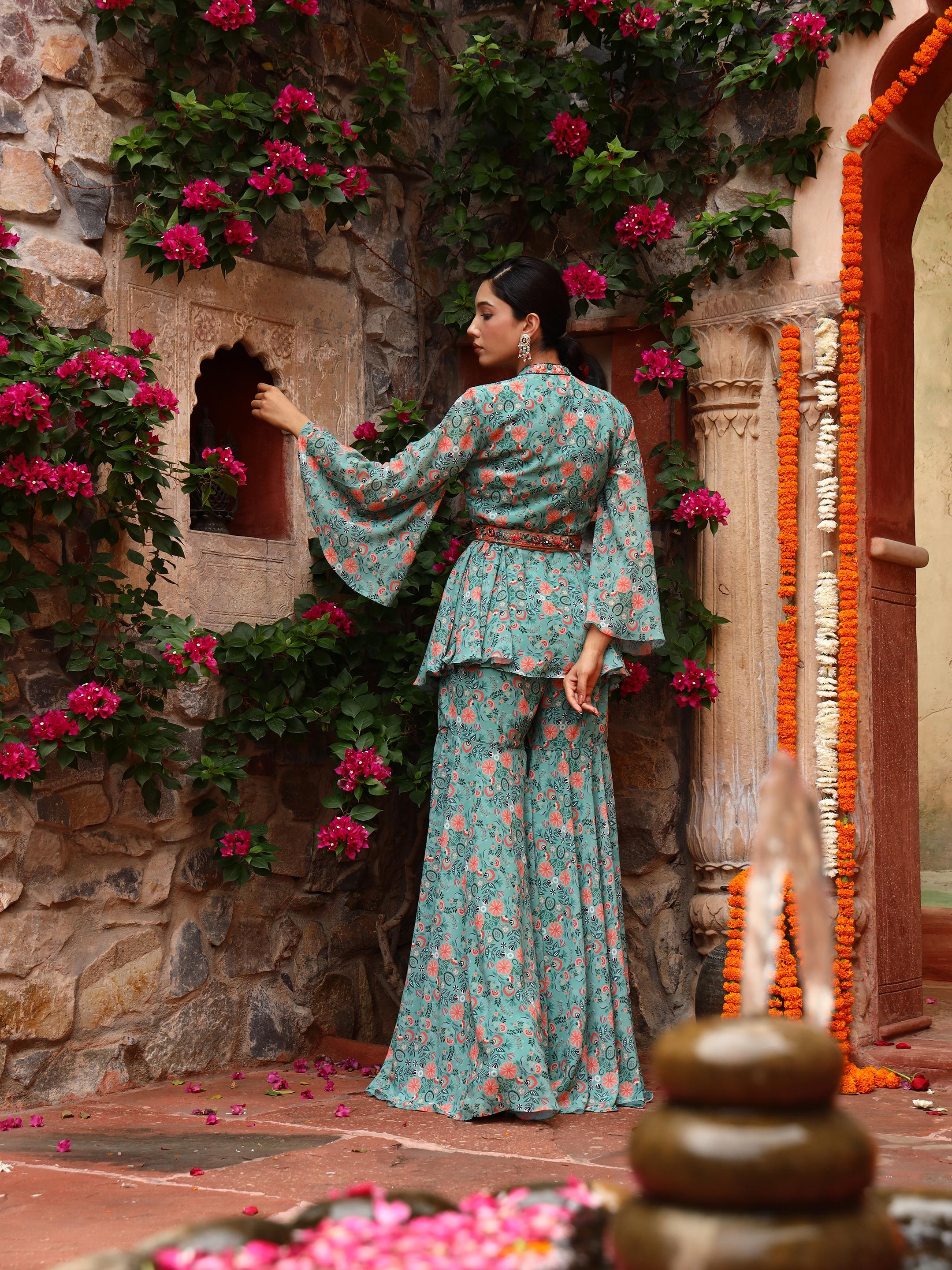 A model showcasing Peony Sharara Set by Miku Kumar from Miku Kumar's collection