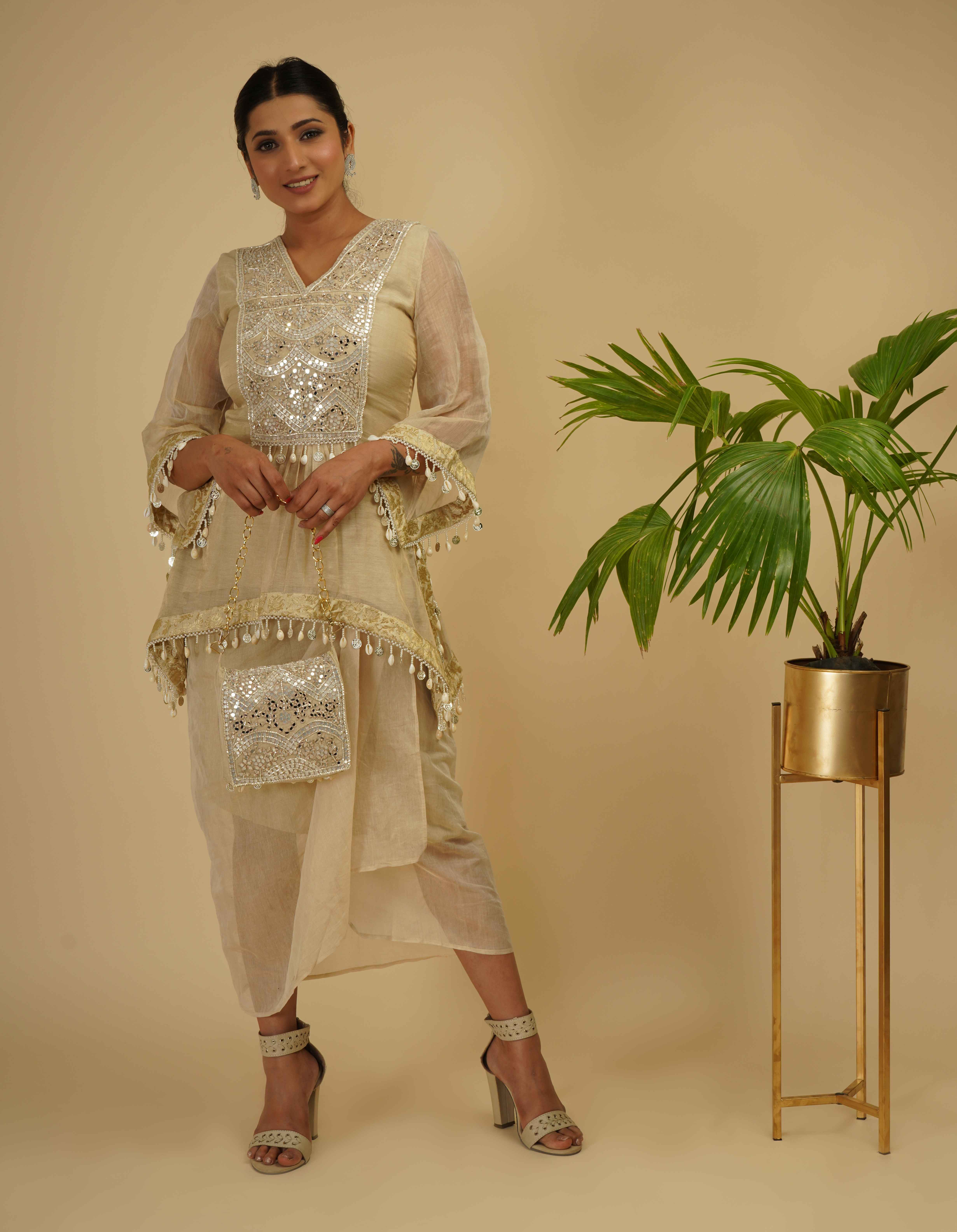 A model showcasing Drape Skirt With Boho Look Kaftan Kurta by Farha Syed from Farha Syed's collection