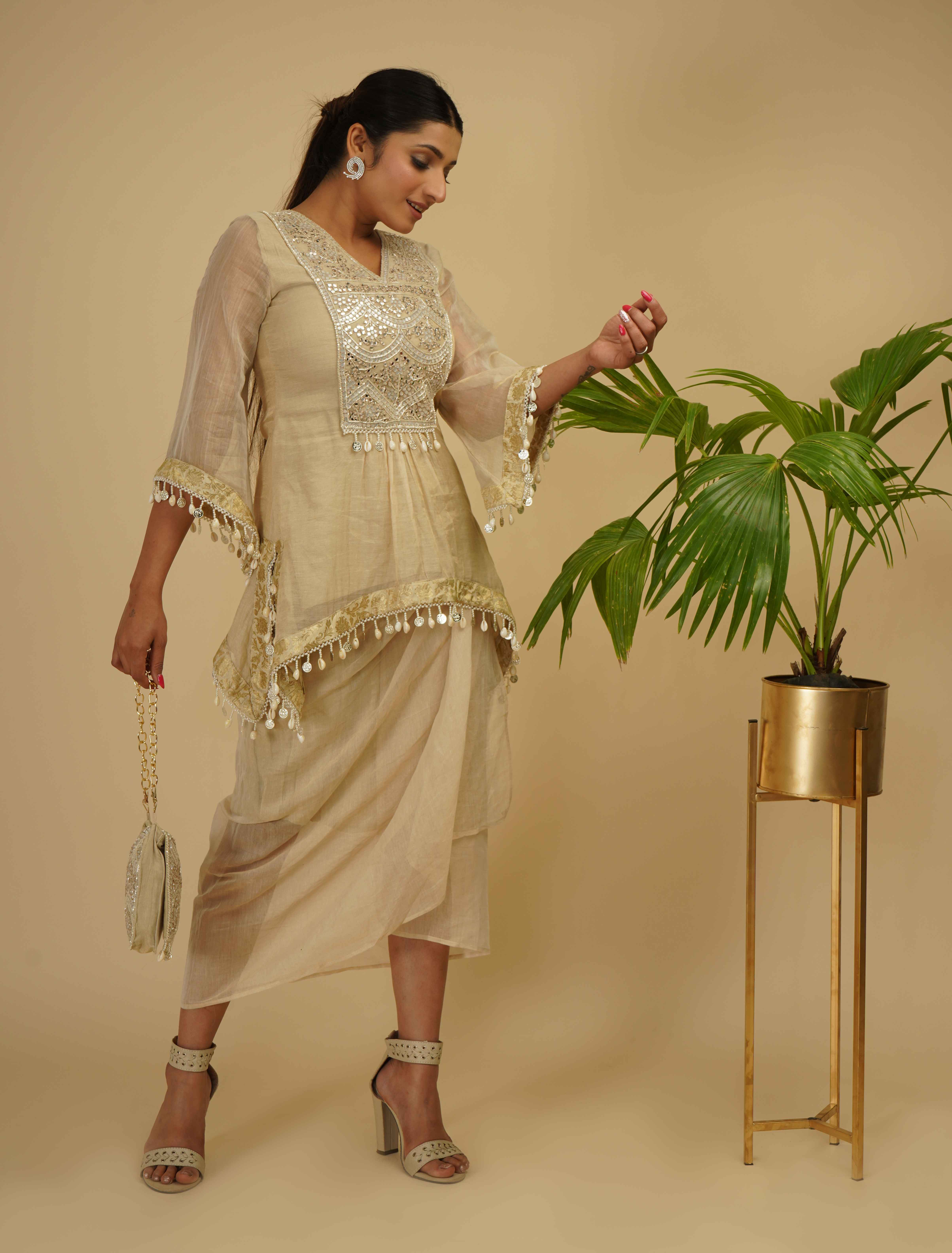 A model showcasing Drape Skirt With Boho Look Kaftan Kurta by Farha Syed from Farha Syed's collection