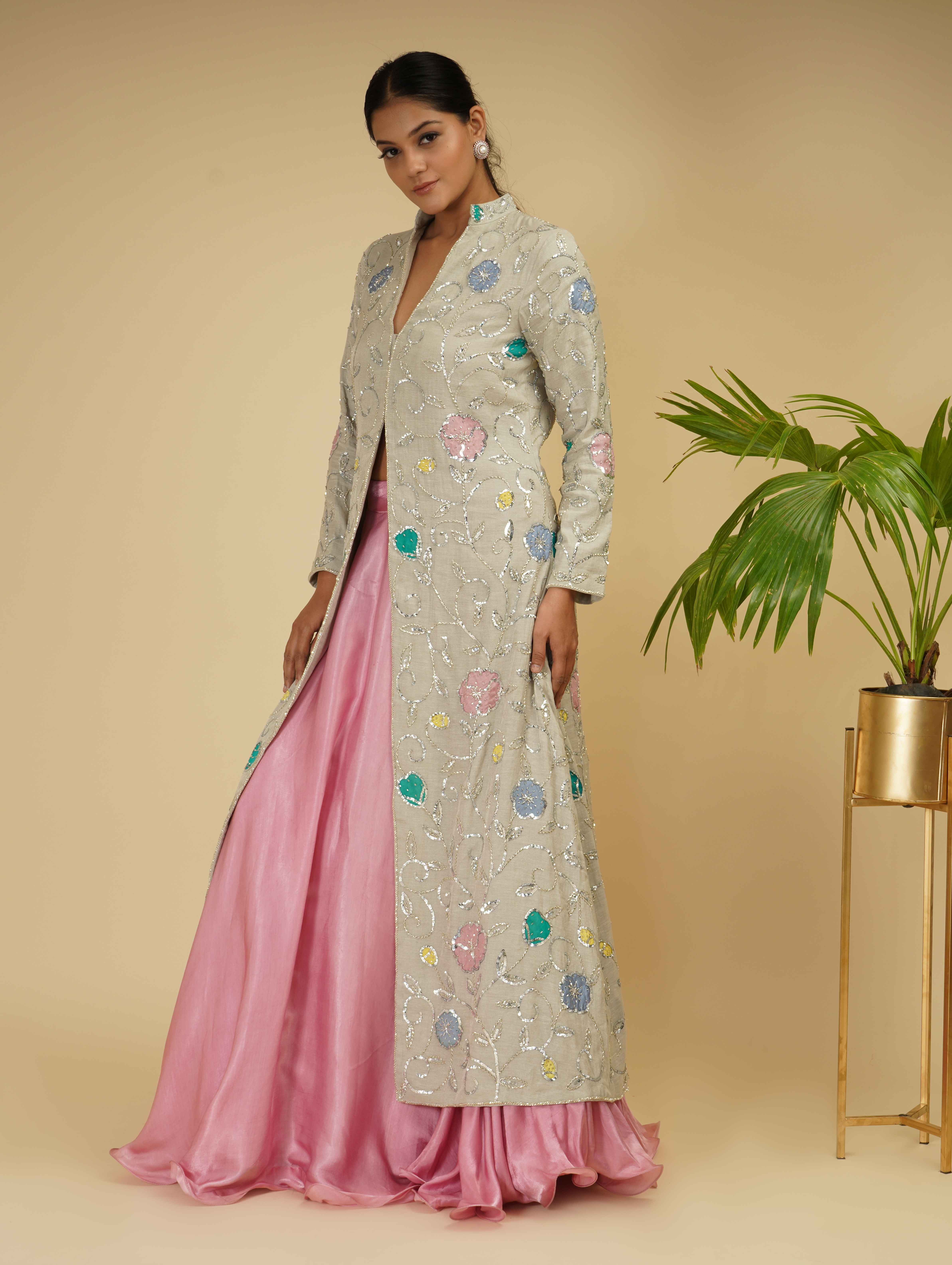 A model showcasing Long Jacket With Skirt by Farha Syed from Farha Syed's collection