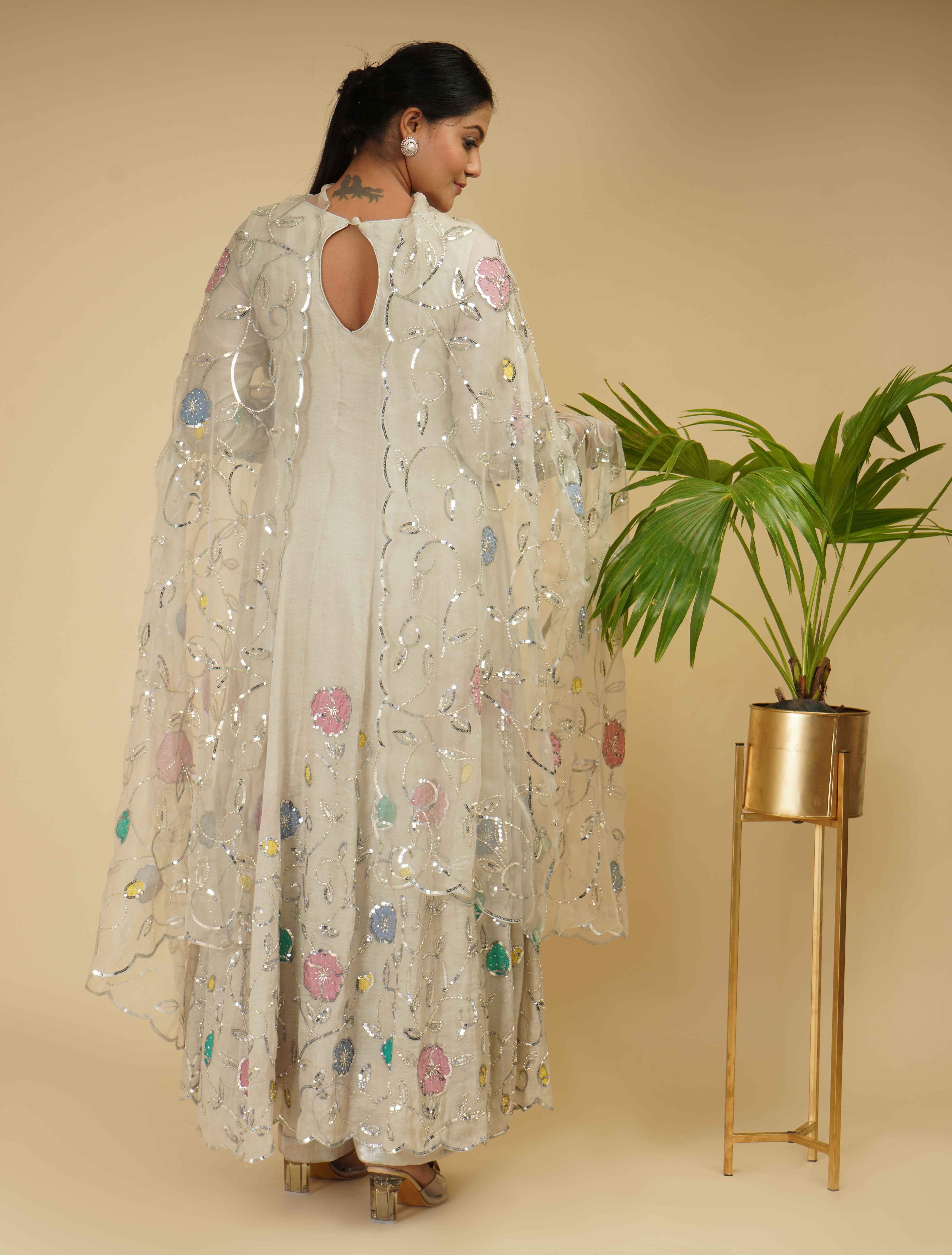A model showcasing 3 Piece Anarkali Set by Farha Syed from Farha Syed's collection