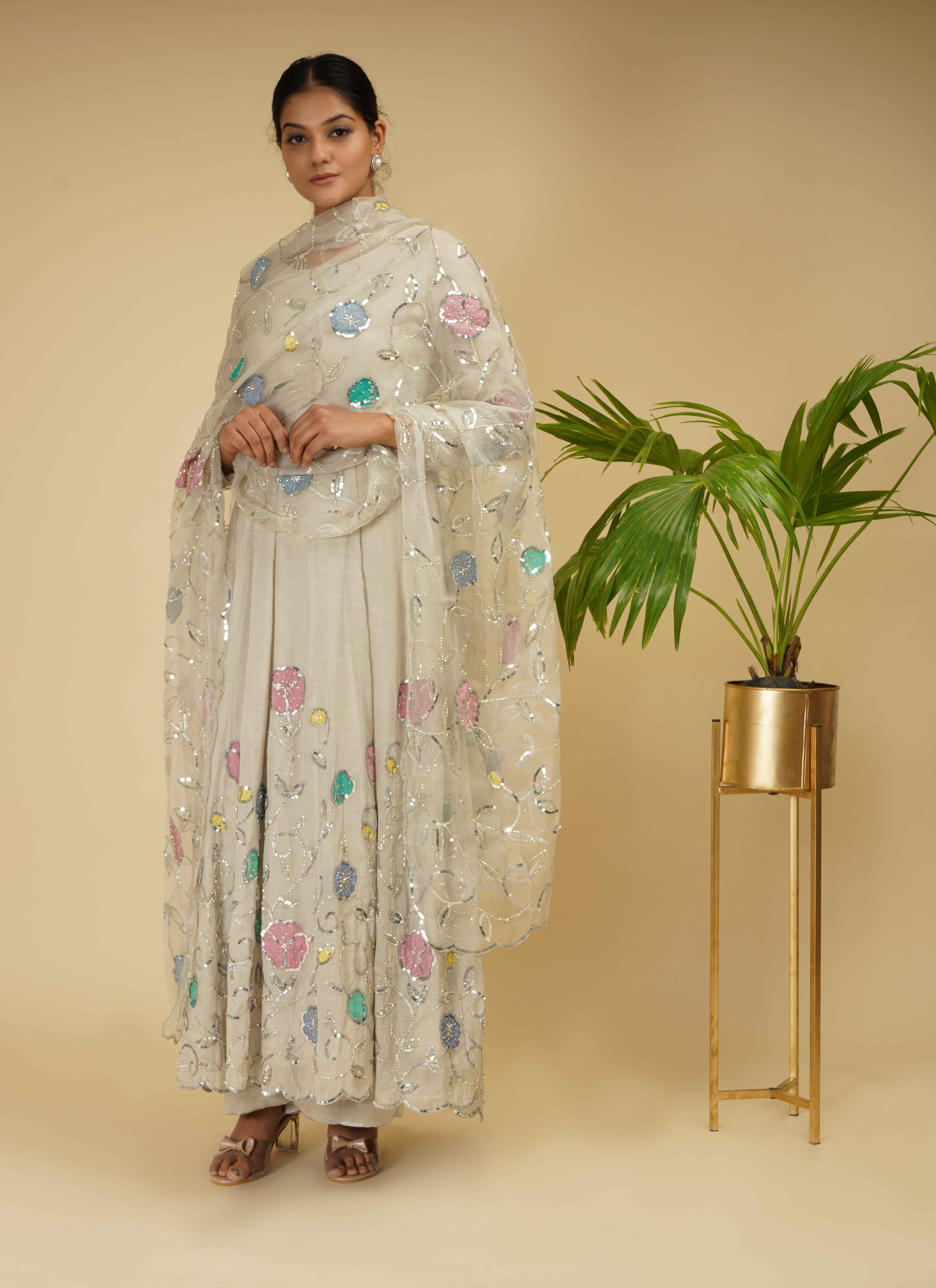 A model showcasing 3 Piece Anarkali Set by Farha Syed from Farha Syed's collection