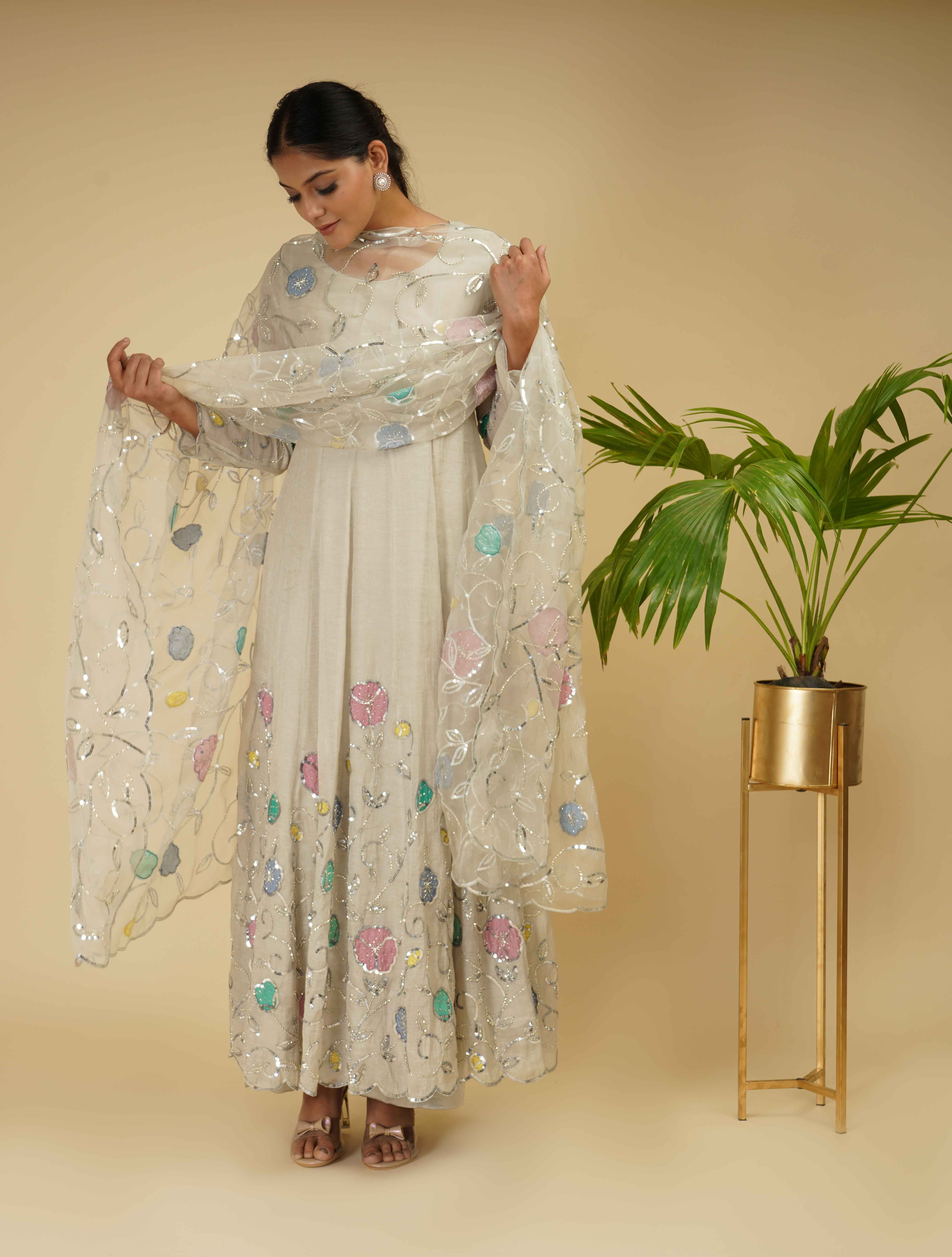 A model showcasing 3 Piece Anarkali Set by Farha Syed from Farha Syed's collection