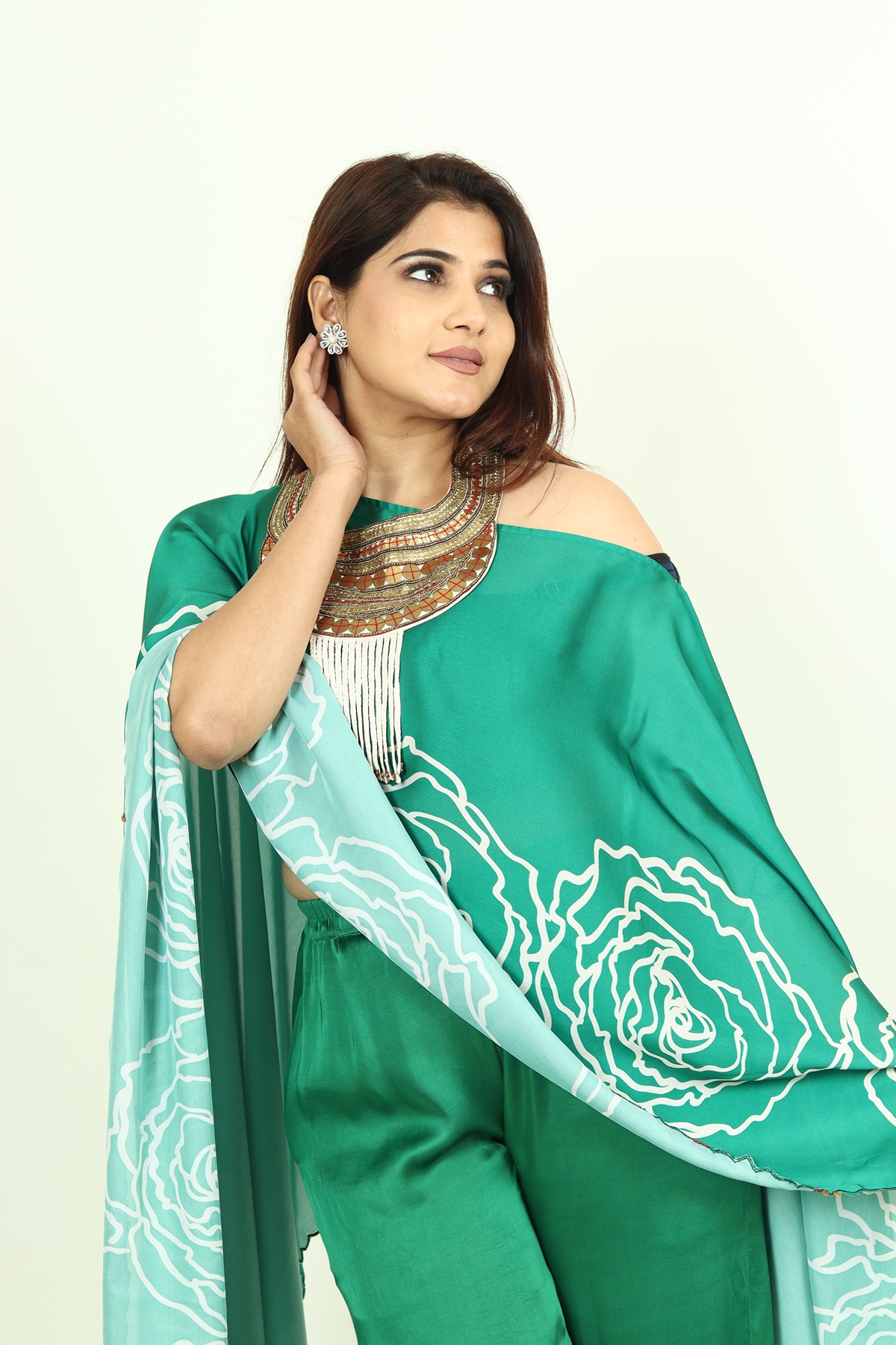 A model showcasing Green Kaftan Dress by Adivaa from Adivaa's collection