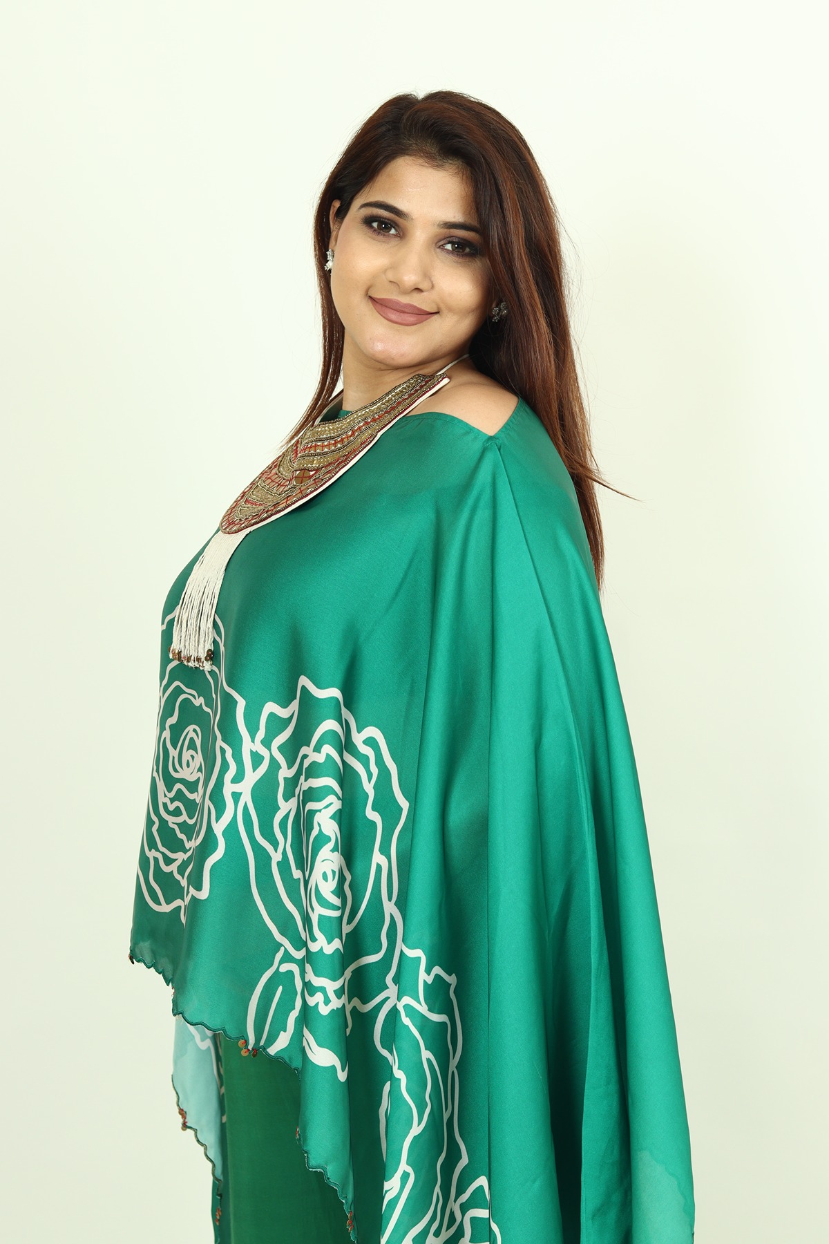 A model showcasing Green Kaftan Dress by Adivaa from Adivaa's collection