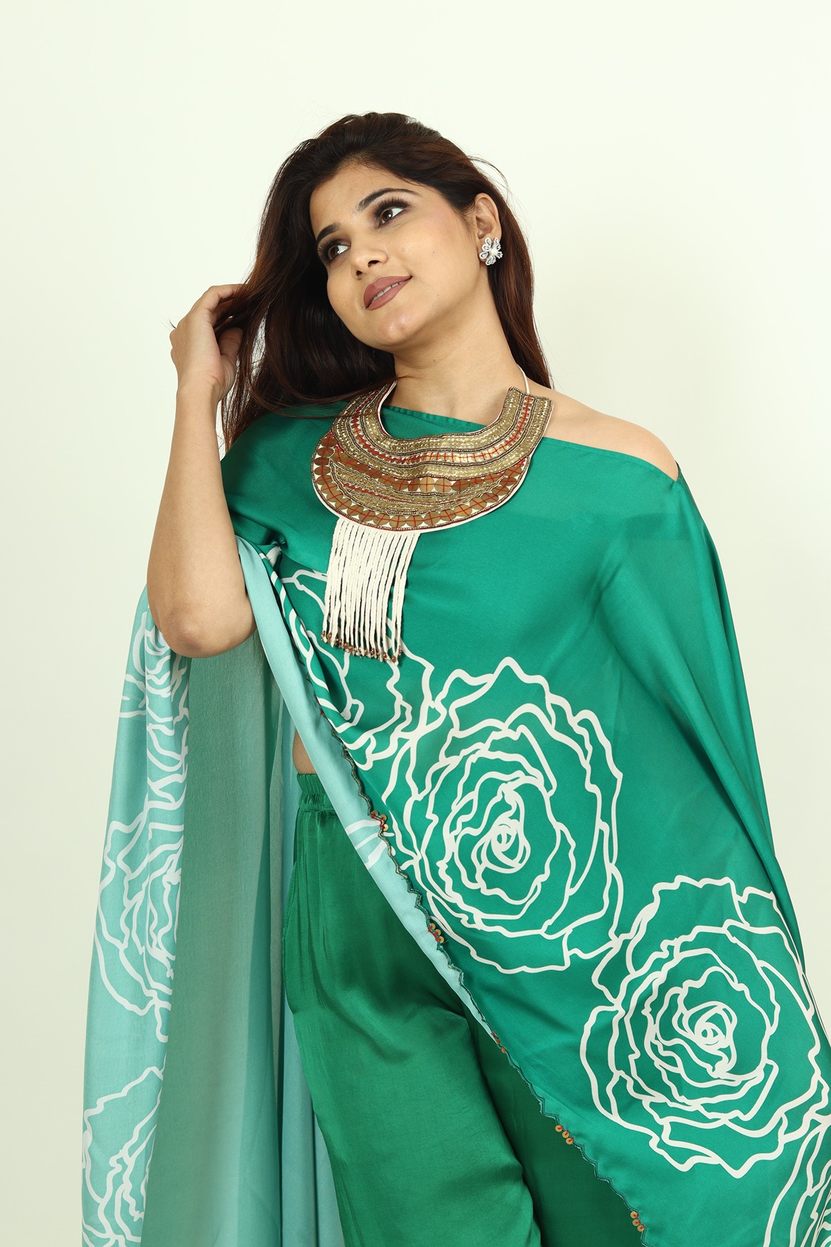 A model showcasing Green Kaftan Dress by Adivaa from Adivaa's collection