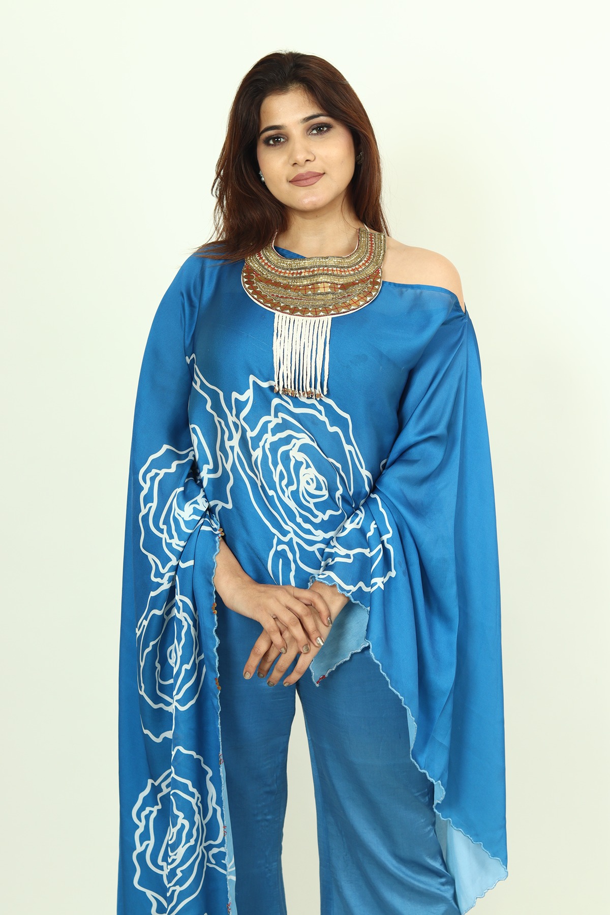 A model showcasing Blue Kaftan Dress by Adivaa from Adivaa's collection