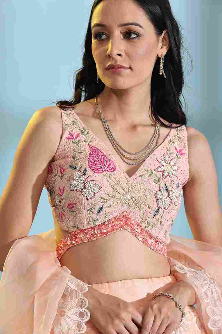 A model showcasing Peach Floral Lehenga by Adivaa from Adivaa's collection