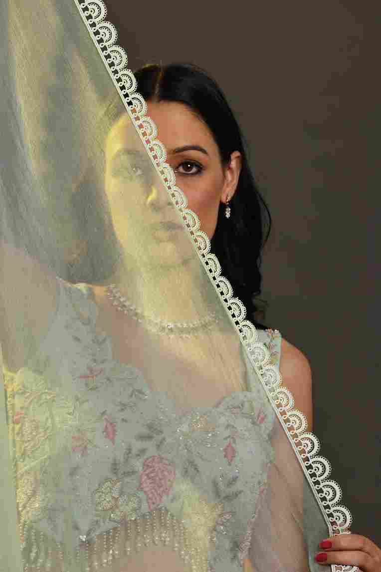 A model showcasing Aqua Drape Set by Adivaa from Adivaa's collection