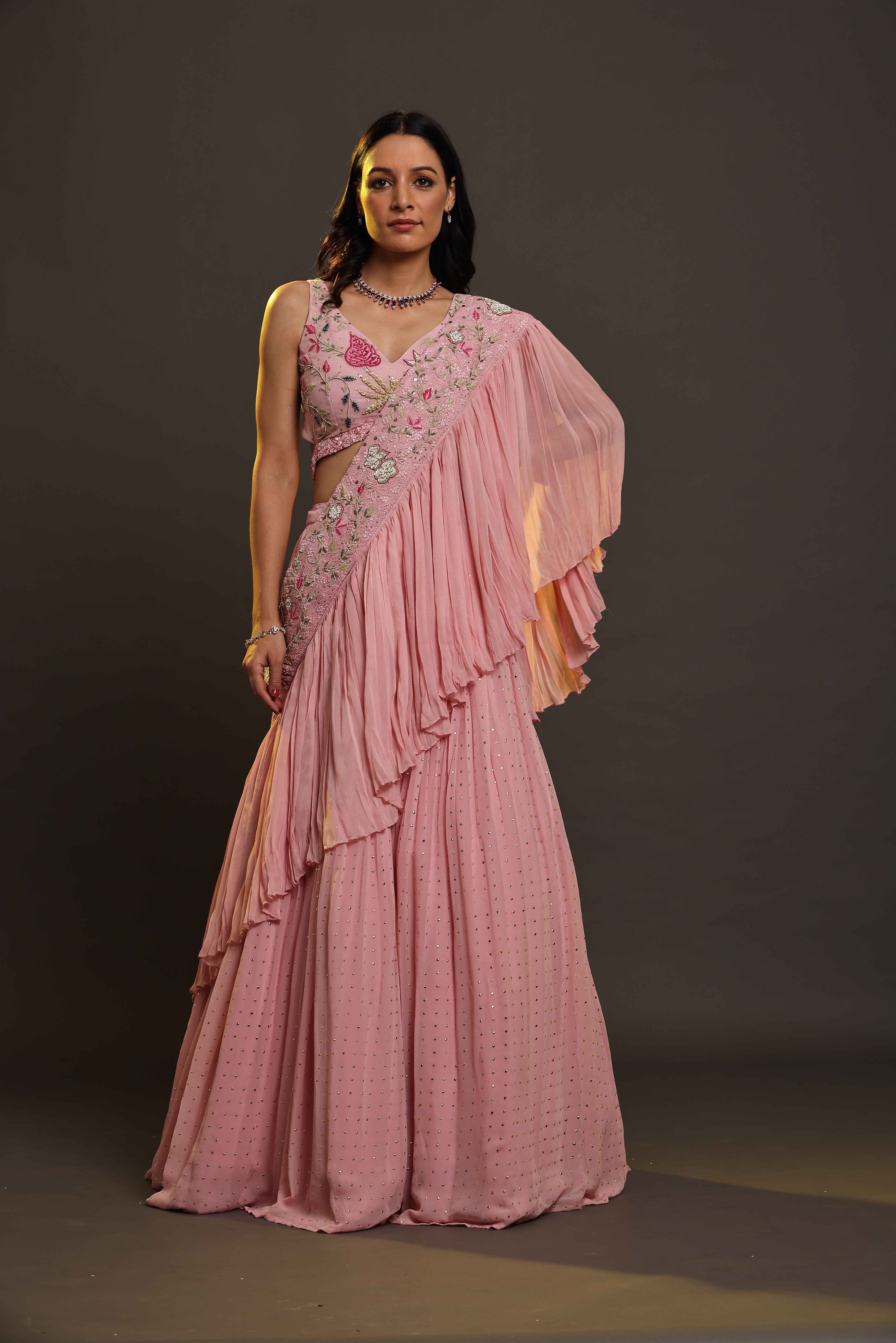 A model showcasing Baby Pink Flared Dress by Adivaa from Adivaa's collection