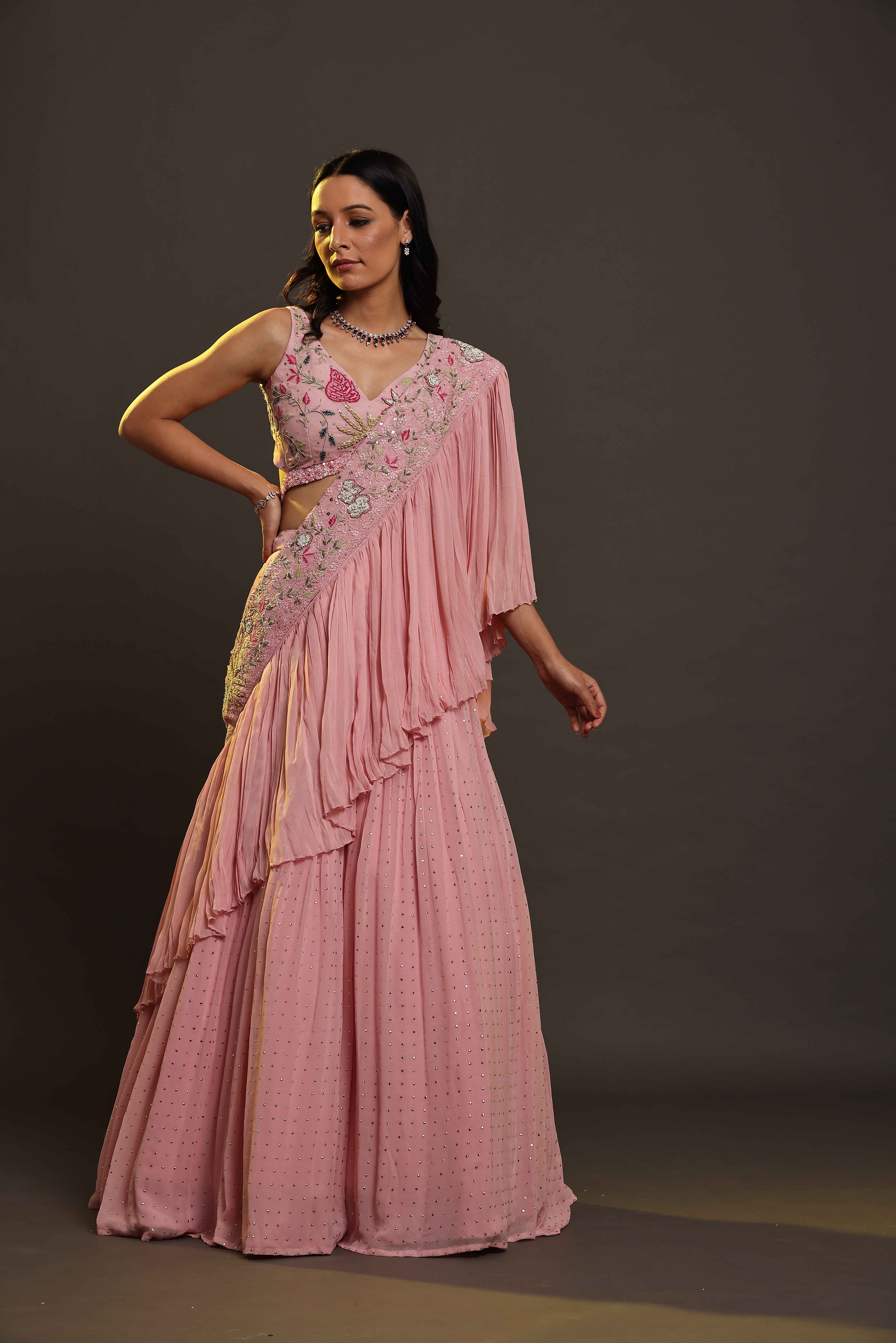 A model showcasing Baby Pink Flared Dress by Adivaa from Adivaa's collection