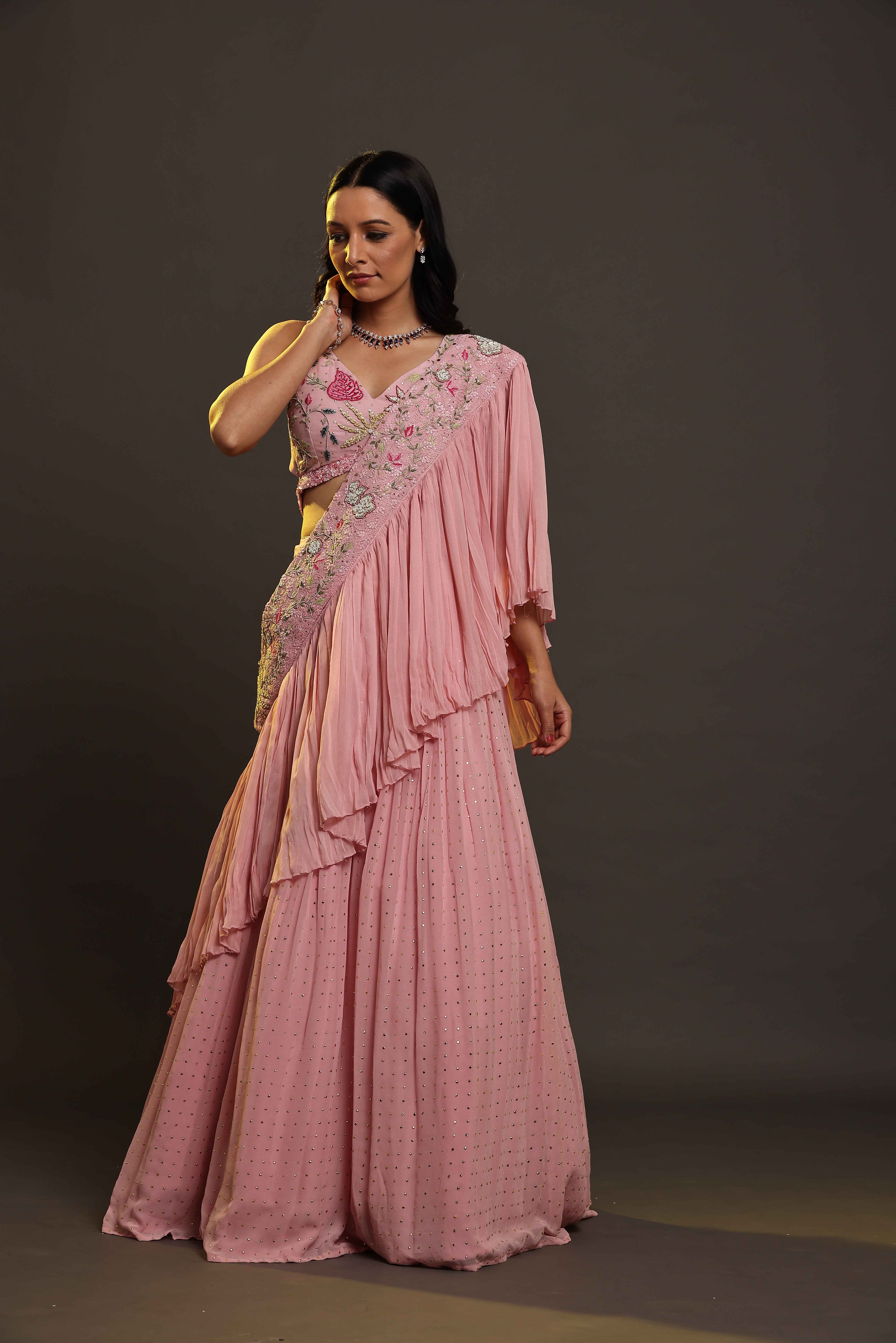 A model showcasing Baby Pink Flared Dress by Adivaa from Adivaa's collection