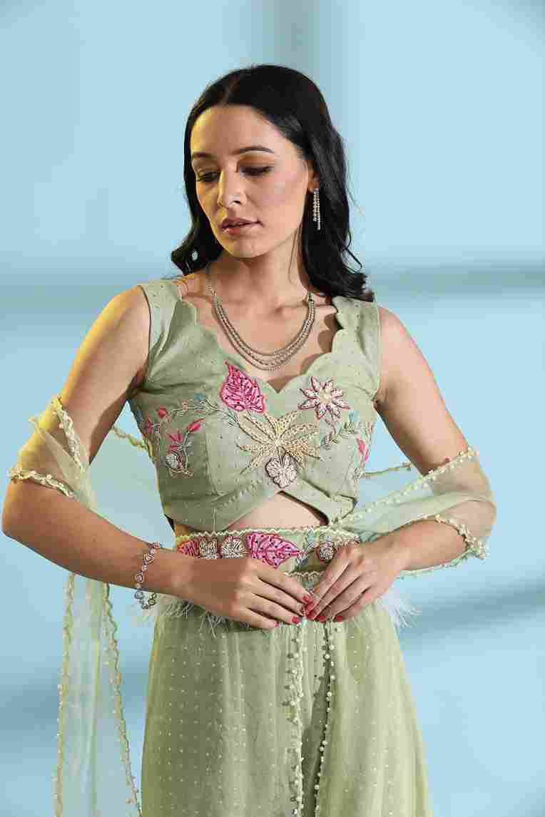 A model showcasing Olive Green Palazzo Sharara Dress by Adivaa from Adivaa's collection
