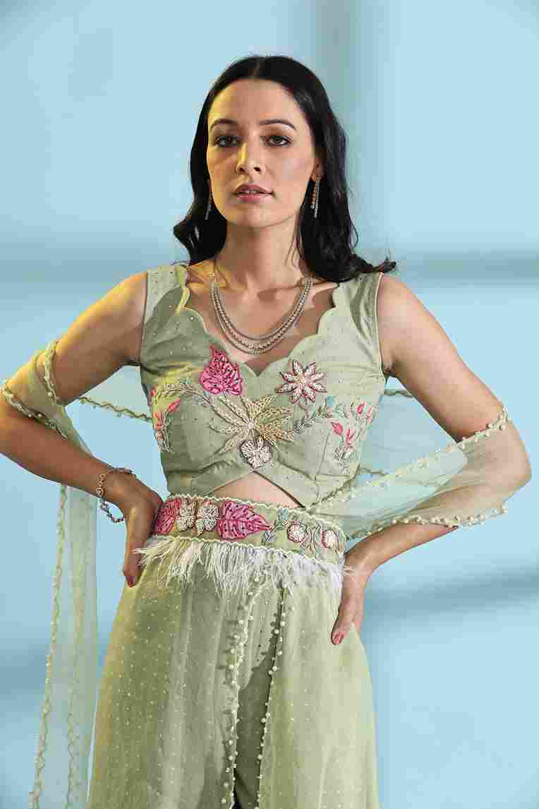 A model showcasing Olive Green Palazzo Sharara Dress by Adivaa from Adivaa's collection
