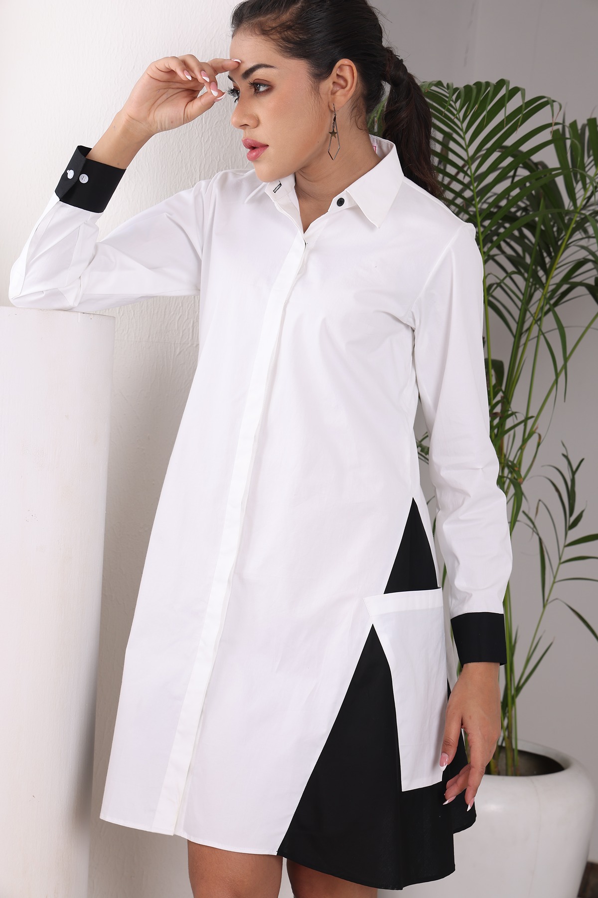 A model showcasing Twocolor Triangula Pocket Style Dress by Adivaa from Adivaa's collection