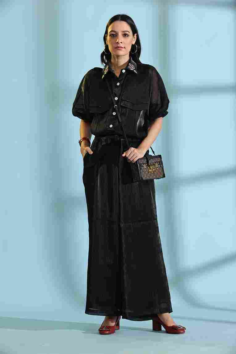 A model showcasing Black Cord Set by Adivaa from Adivaa's collection
