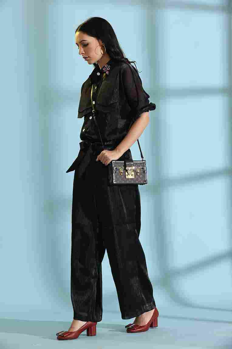 A model showcasing Black Cord Set by Adivaa from Adivaa's collection