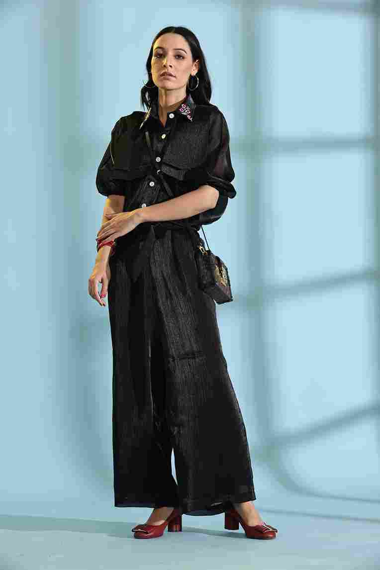 A model showcasing Black Cord Set by Adivaa from Adivaa's collection