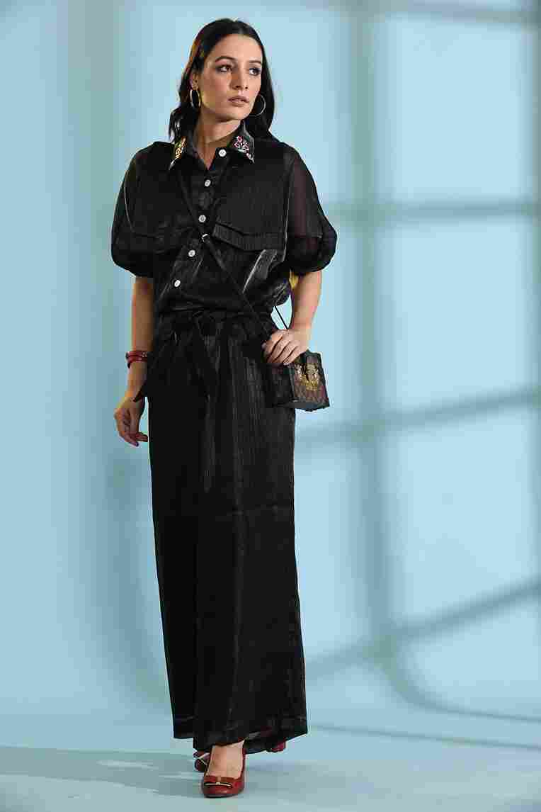 A model showcasing Black Cord Set by Adivaa from Adivaa's collection