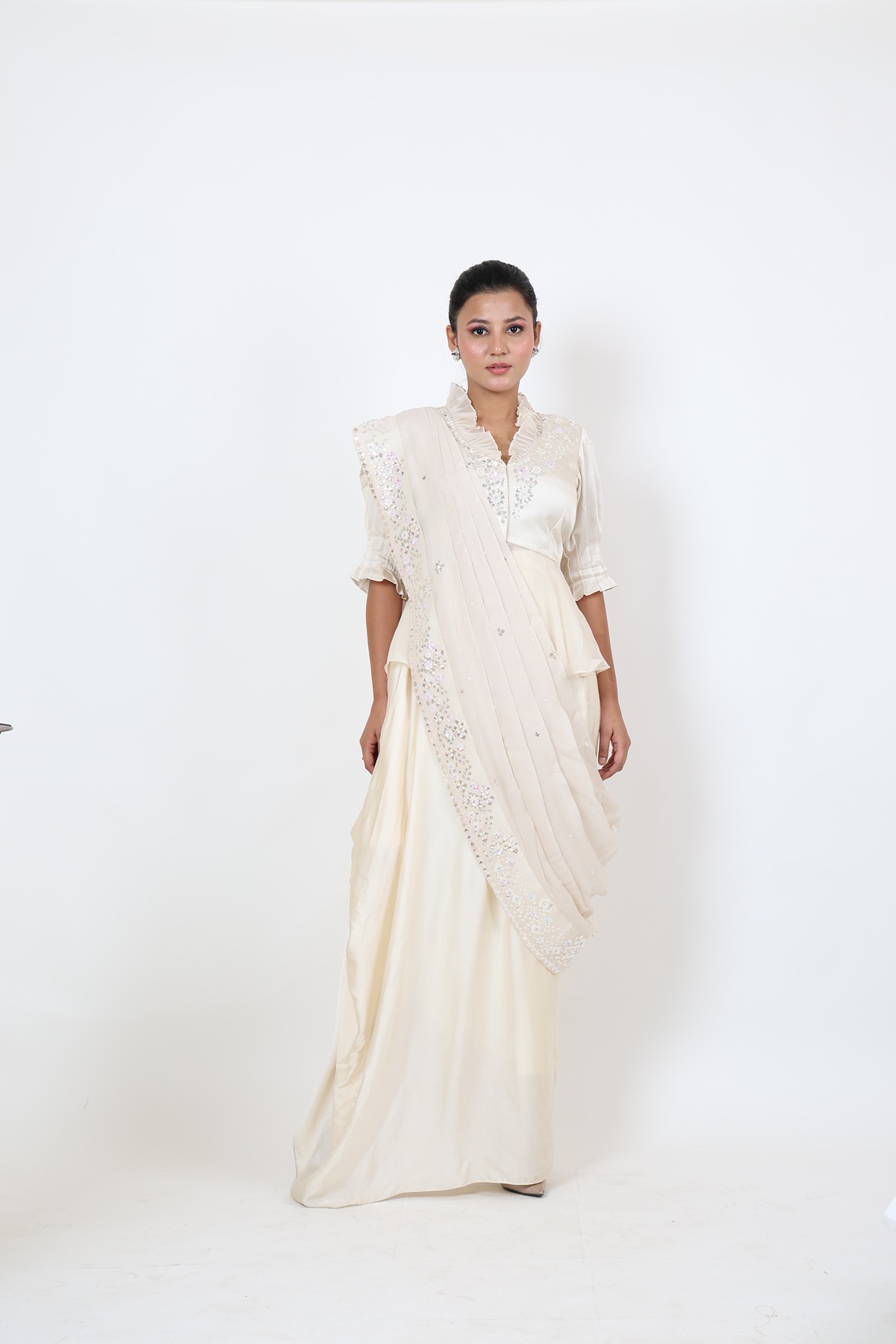 A model showcasing Ivory Dhoti Saree by Adivaa from Adivaa's collection