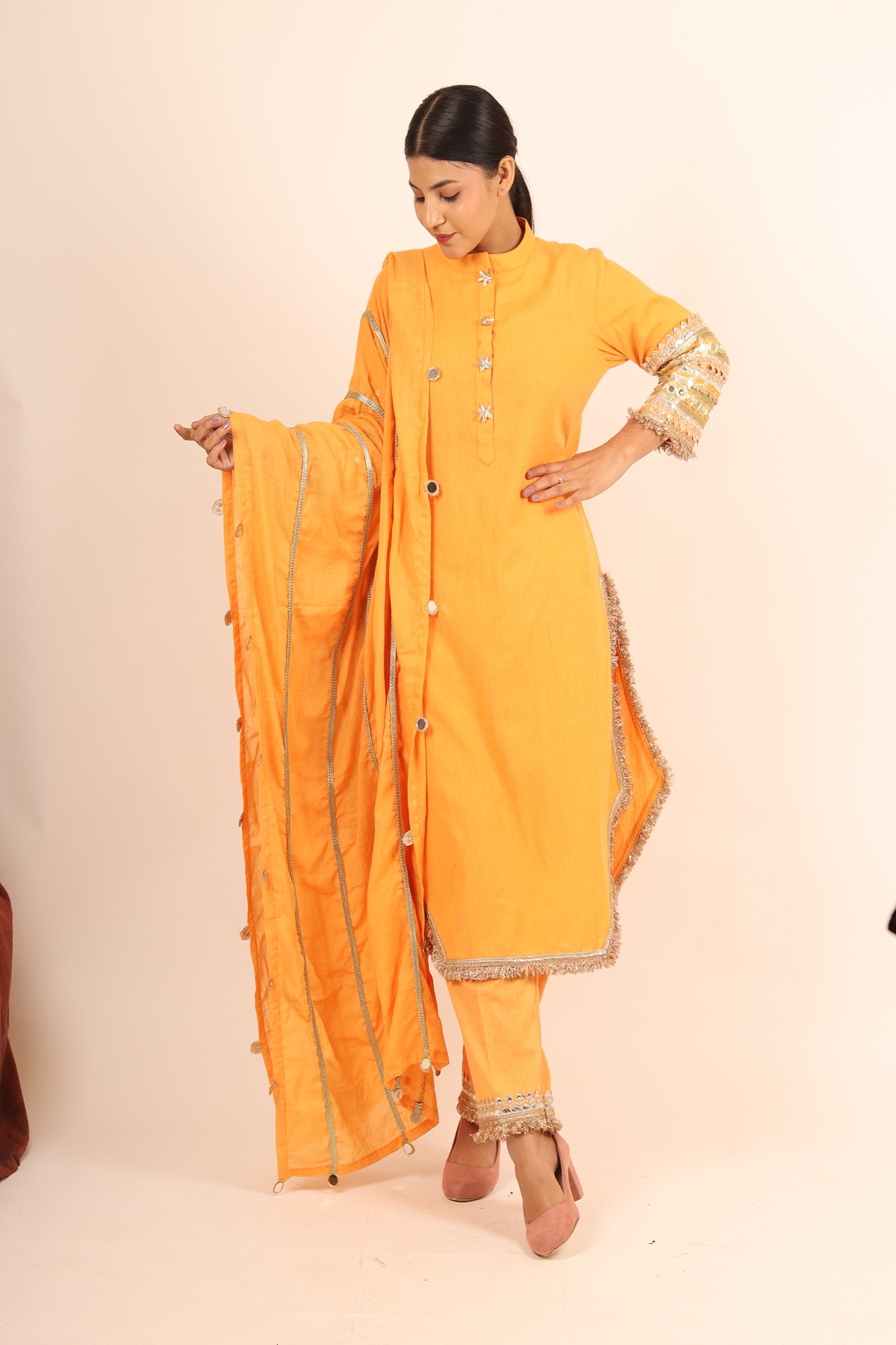 A model showcasing Yellow Long Kurta With Cigarette Pants by Adivaa from Adivaa's collection