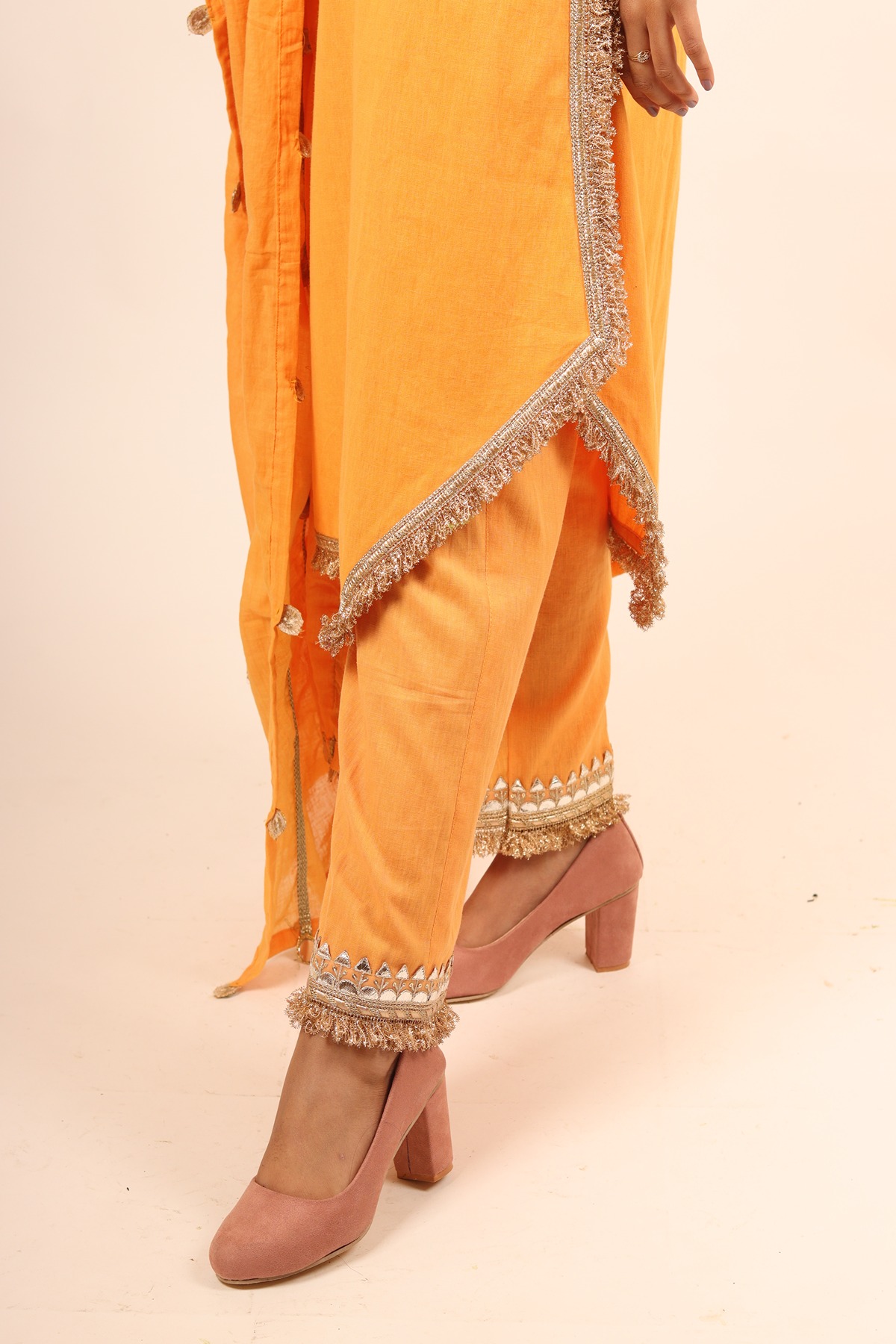 A model showcasing Yellow Long Kurta With Cigarette Pants by Adivaa from Adivaa's collection