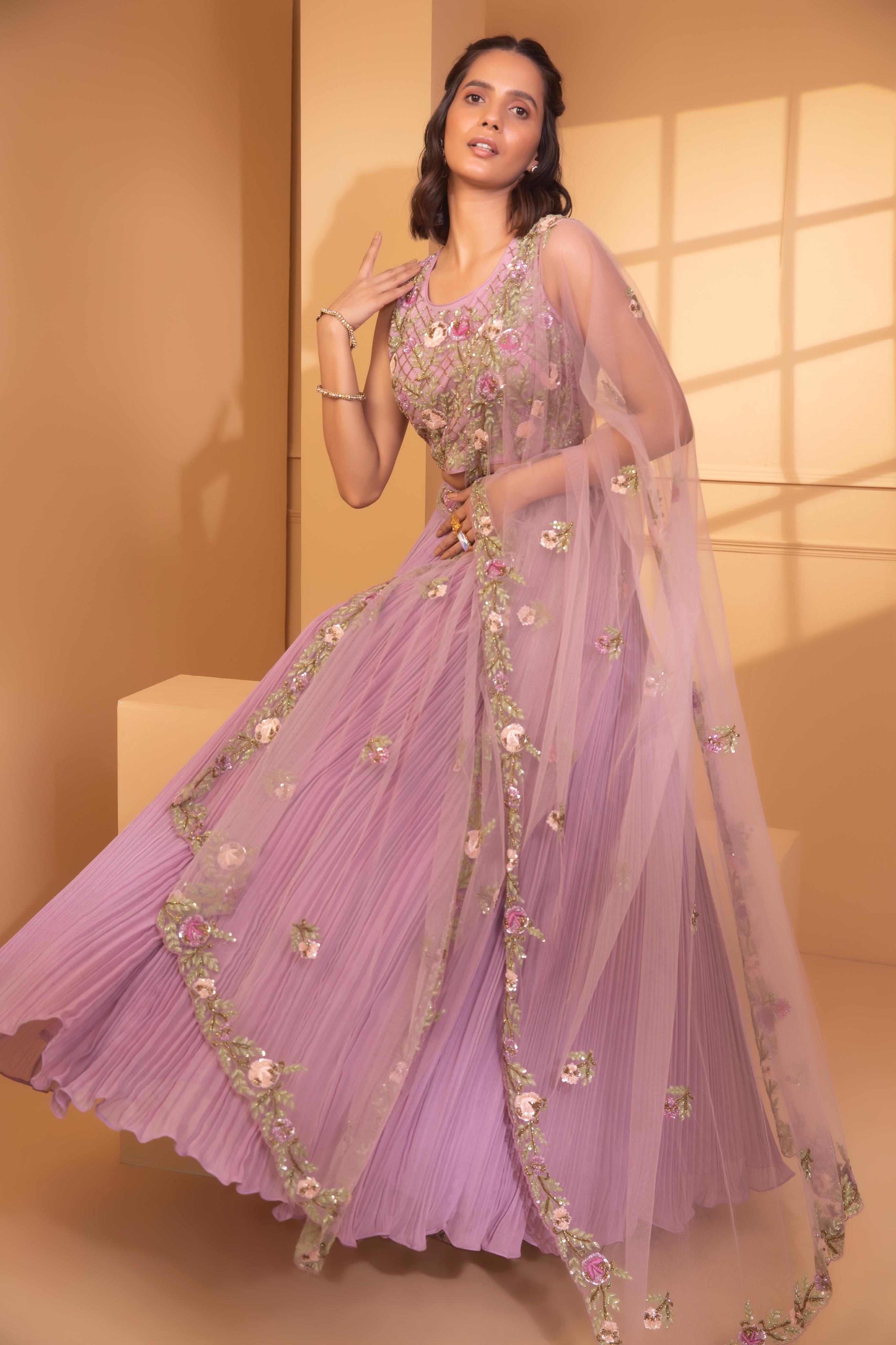 A model showcasing Mintaka Embriodery Lehenga Set by Miku Kumar from Miku Kumar's collection