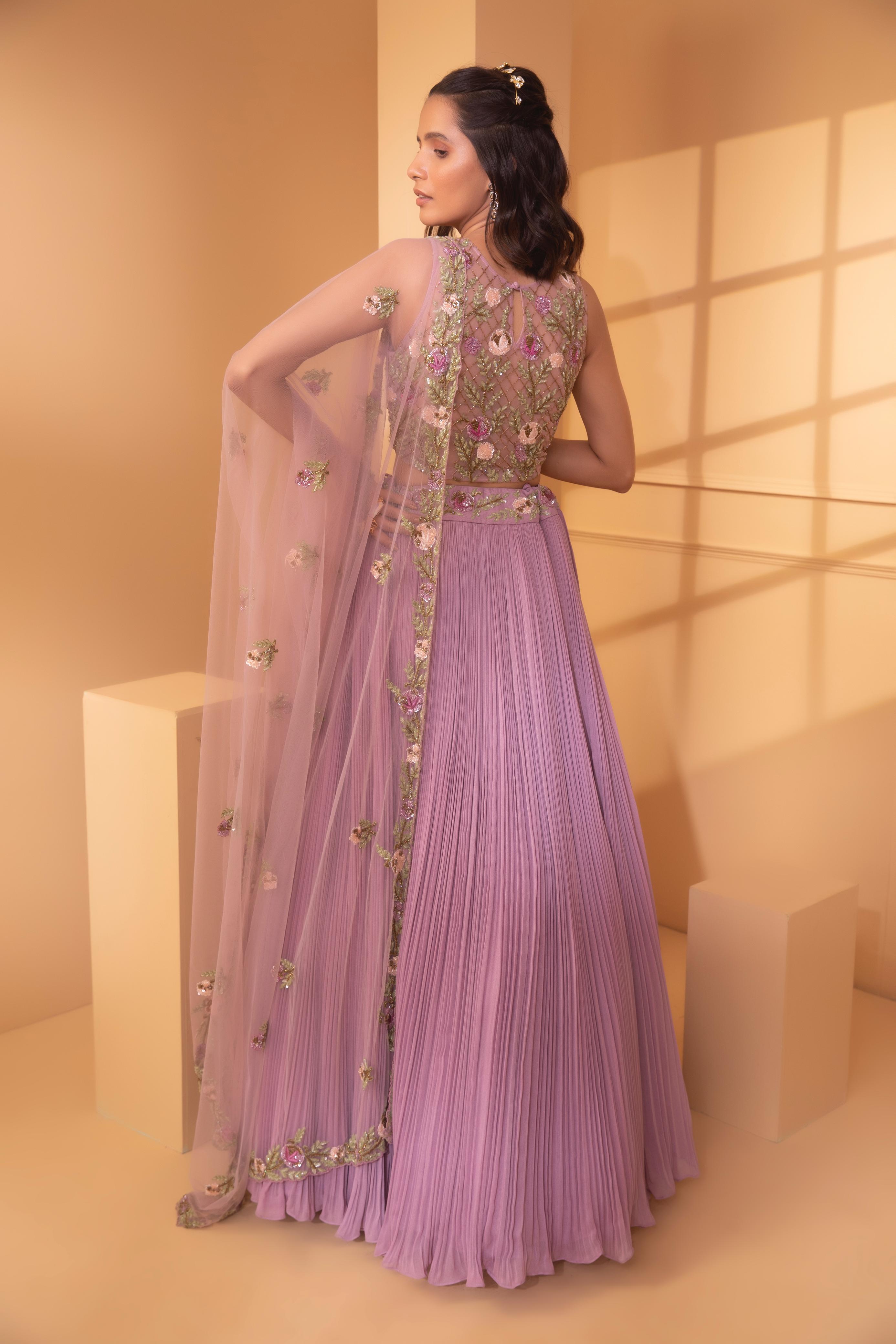 A model showcasing Mintaka Embriodery Lehenga Set by Miku Kumar from Miku Kumar's collection