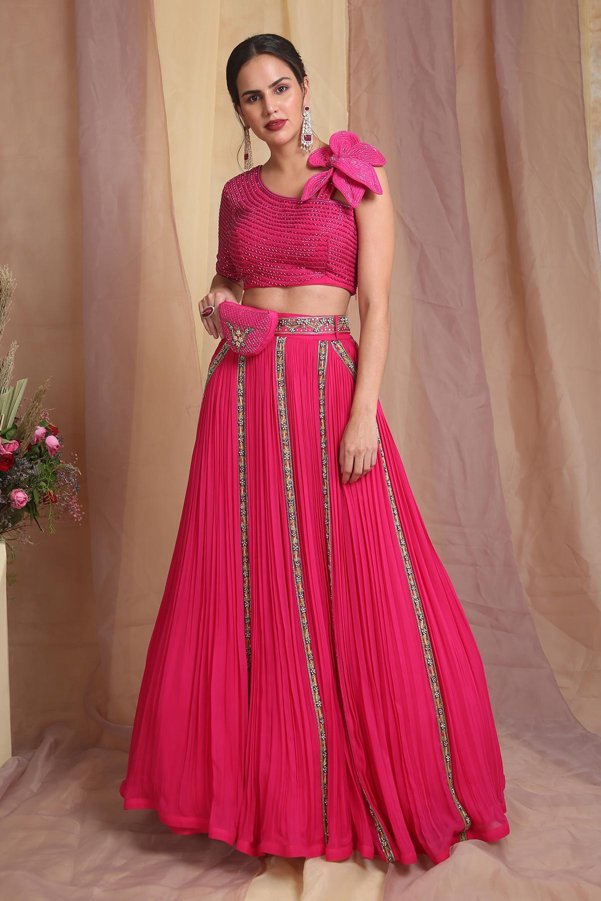 A model showcasing Hot Pink Flora Lehenga Set by Miku Kumar from Miku Kumar's collection