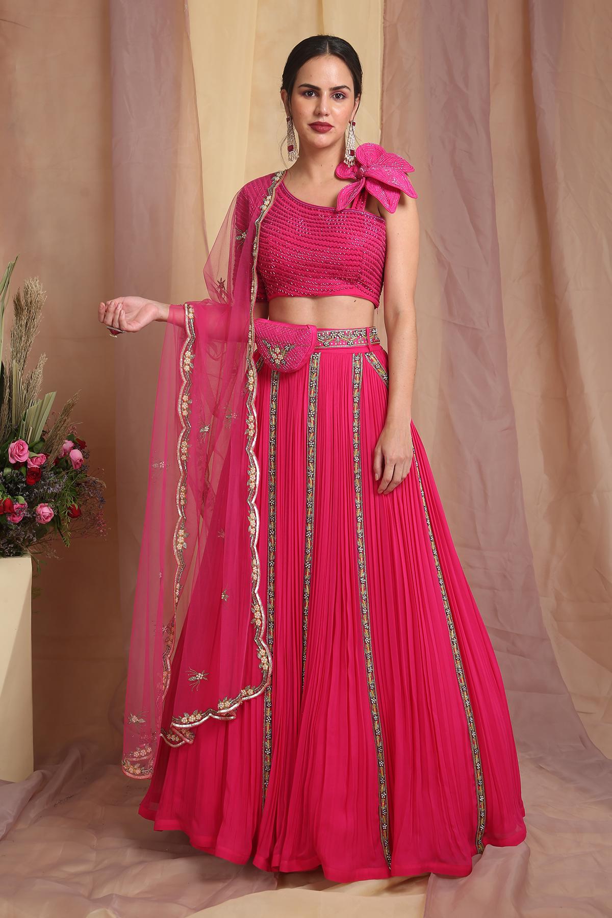 A model showcasing Hot Pink Flora Lehenga Set by Miku Kumar from Miku Kumar's collection