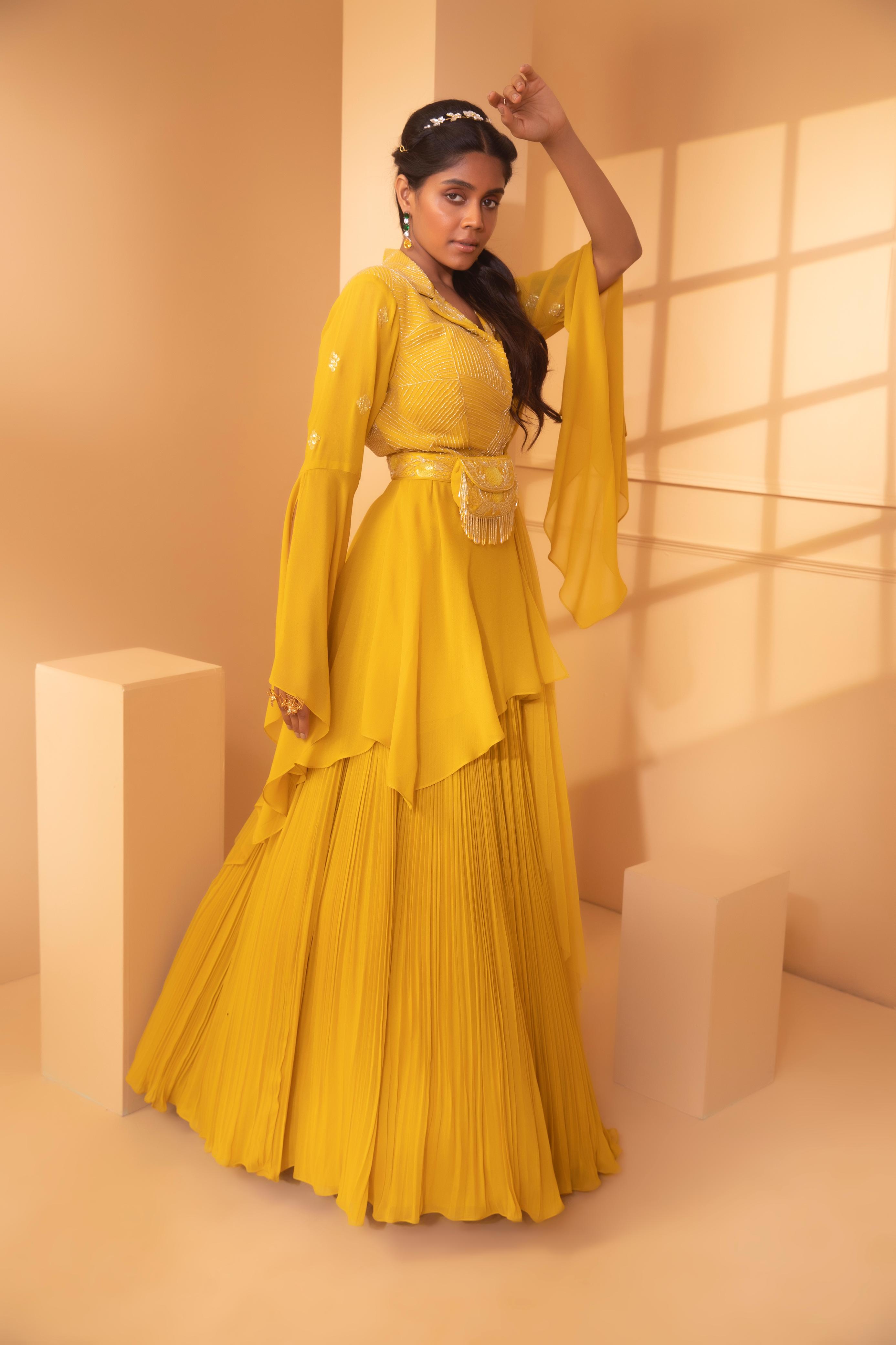 A model showcasing Gaer Peplum Lehenga Set by Miku Kumar from Miku Kumar's collection