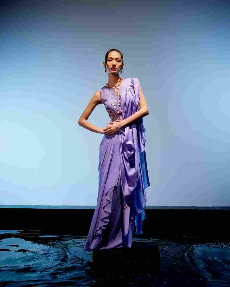A model showcasing Lilian Drape Saree by Miku Kumar from Miku Kumar's collection