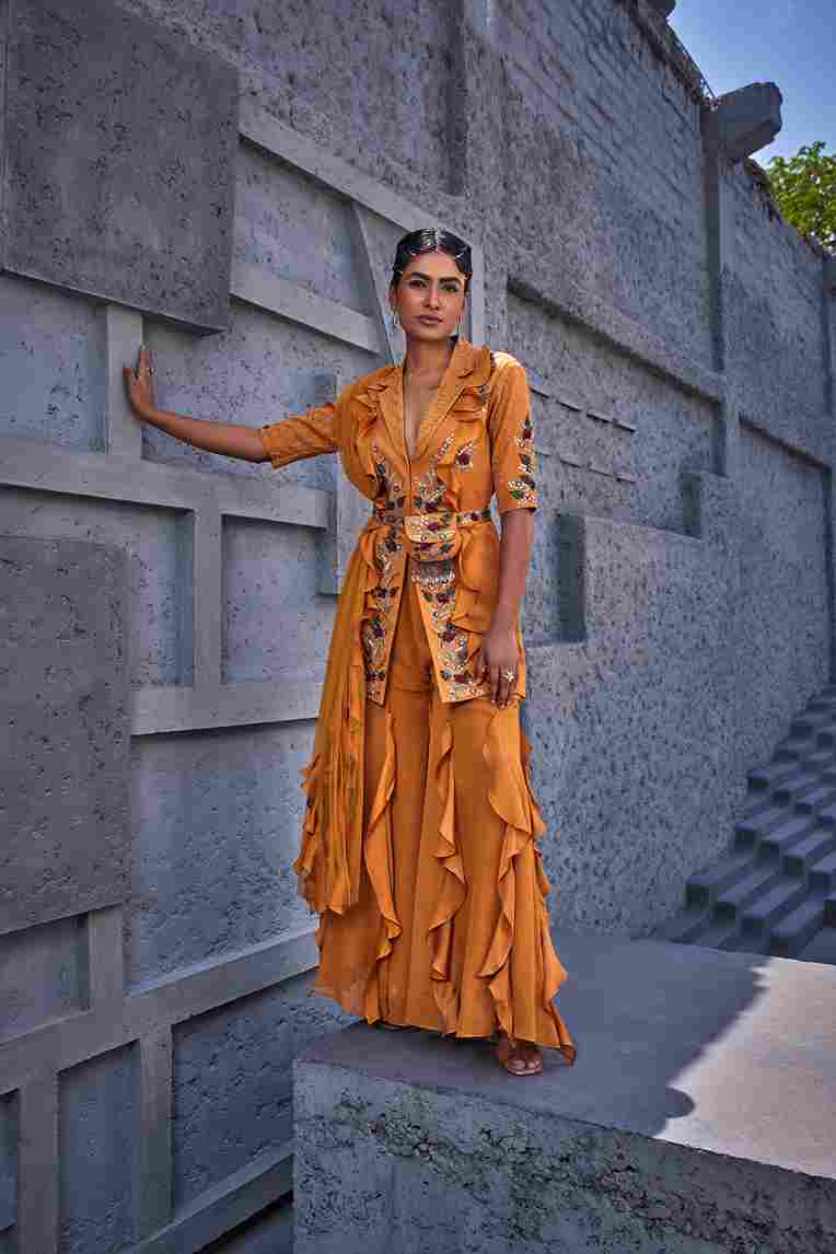 A model showcasing Kashish Jacket Sharara Set by Miku Kumar from Miku Kumar's collection