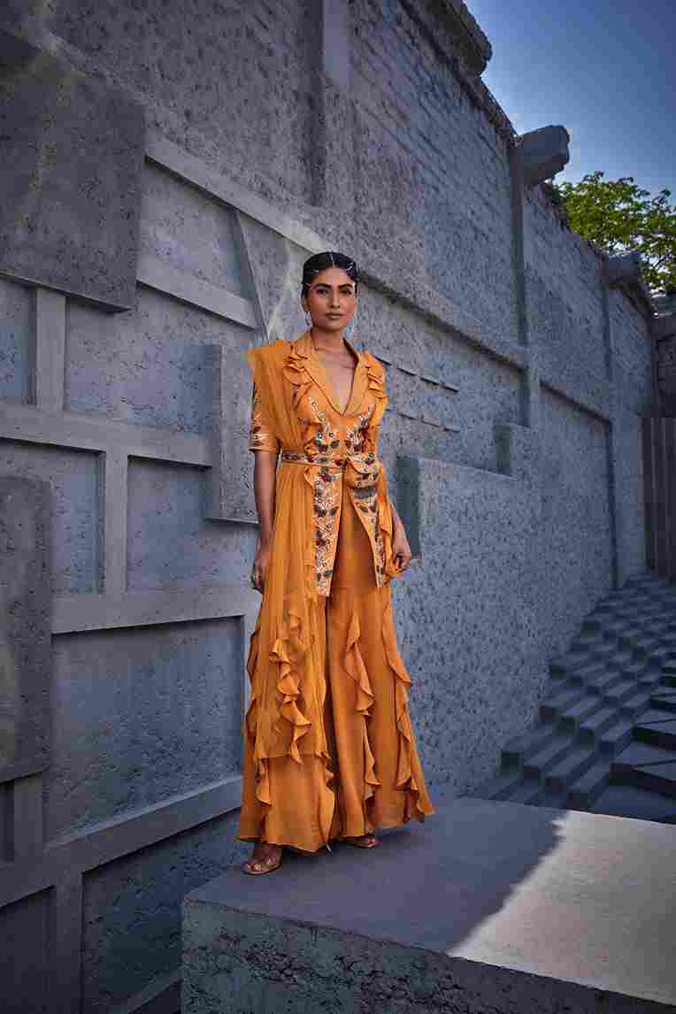 A model showcasing Kashish Jacket Sharara Set by Miku Kumar from Miku Kumar's collection