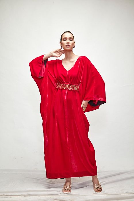 A model showcasing Fuschia Velvet Kaftaan by Ranian from Ranian's collection