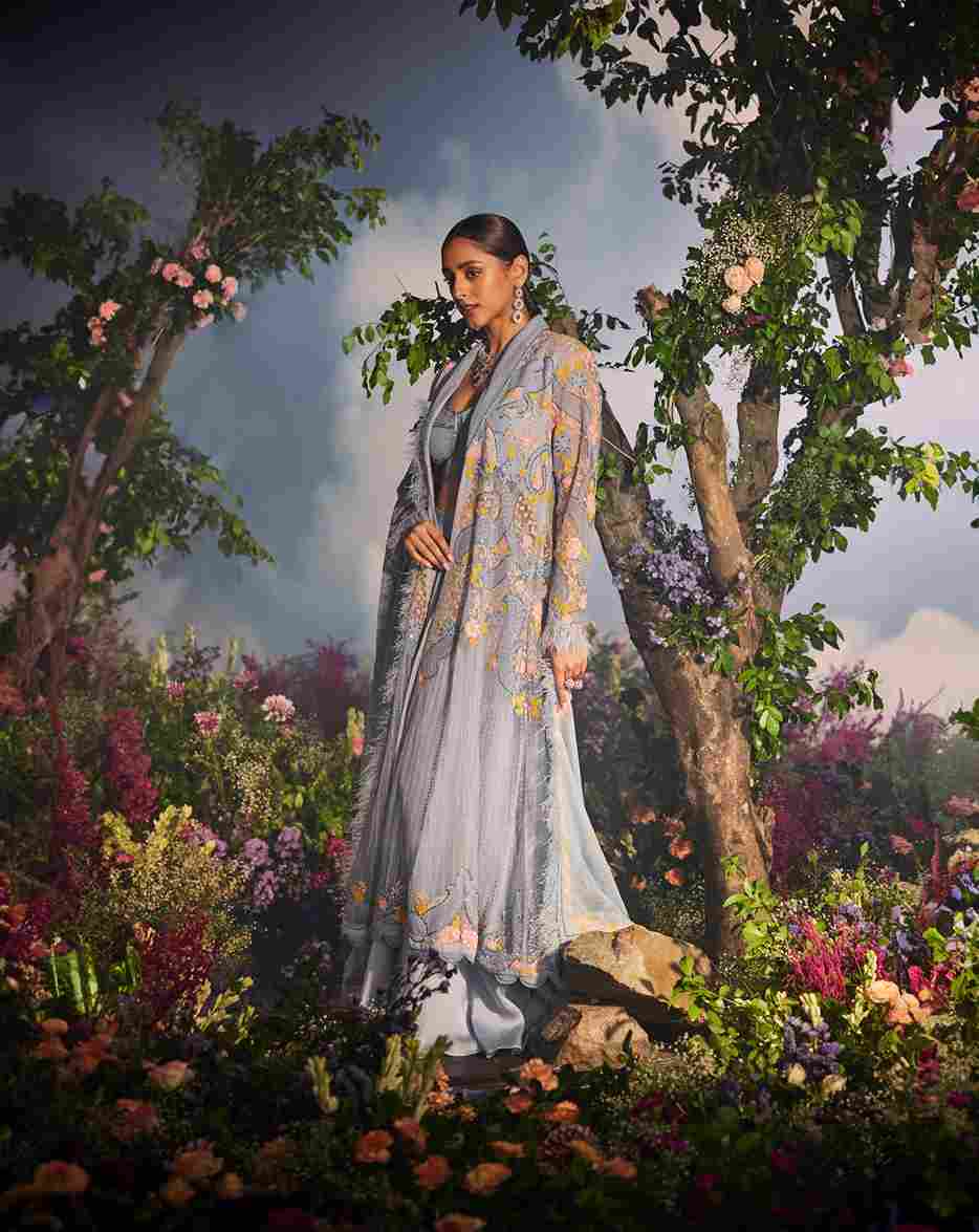 A model showcasing Evara Jacket Set by Miku Kumar from Miku Kumar's collection