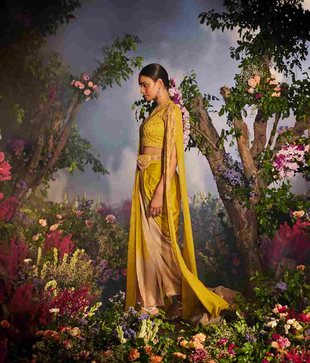 A model showcasing Azra Cape Set by Miku Kumar from Miku Kumar's collection