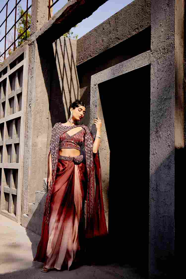 A model showcasing Dual Color Indo Western Dress by Miku Kumar from Miku Kumar's collection