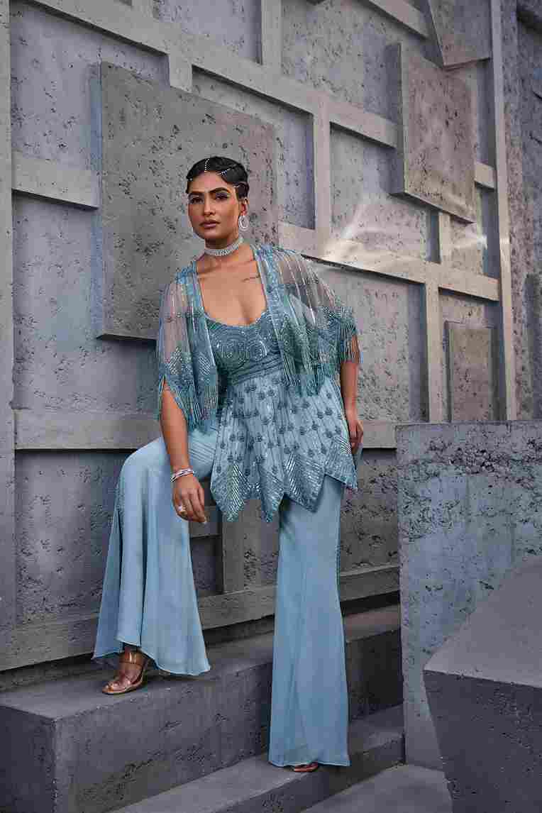 A model showcasing Blue Indowetern Kurti With Retro Pants by Miku Kumar from Miku Kumar's collection