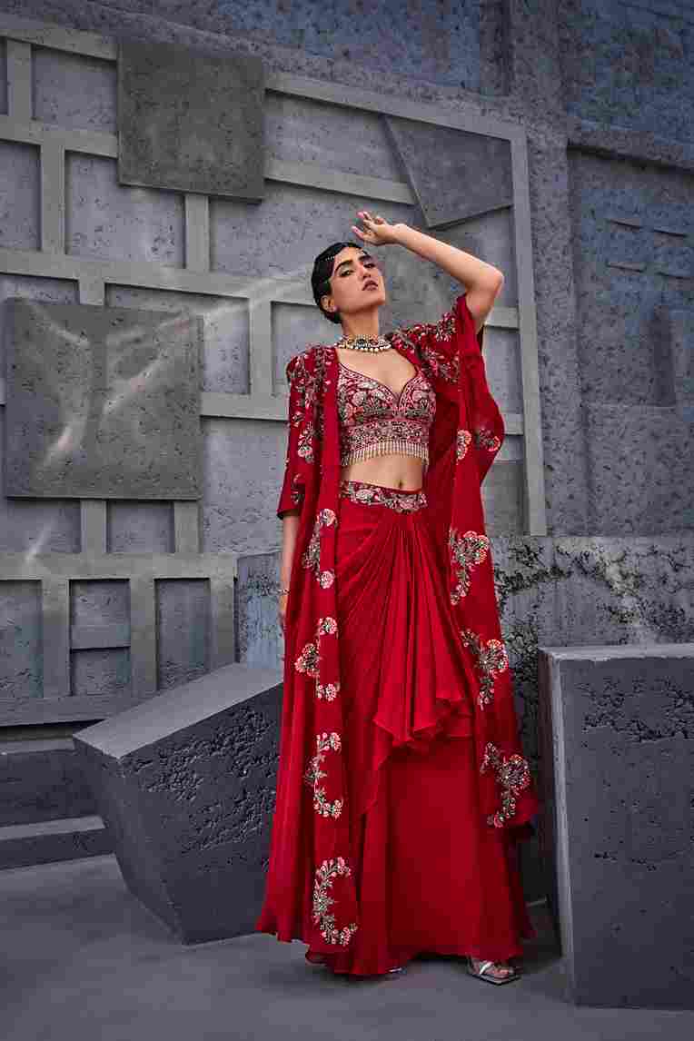 A model showcasing Red Indo Western Skirt Set by Miku Kumar from Miku Kumar's collection