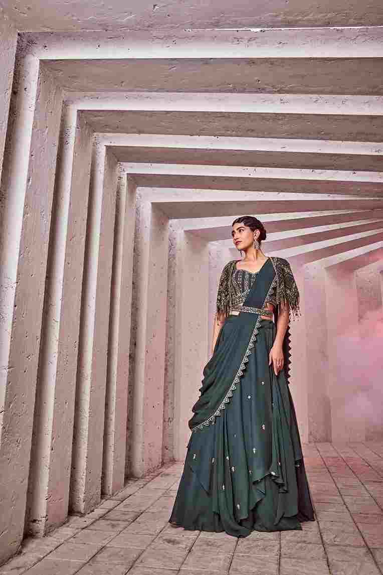 A model showcasing Drape Saree With Flared Panels by Miku Kumar from Miku Kumar's collection