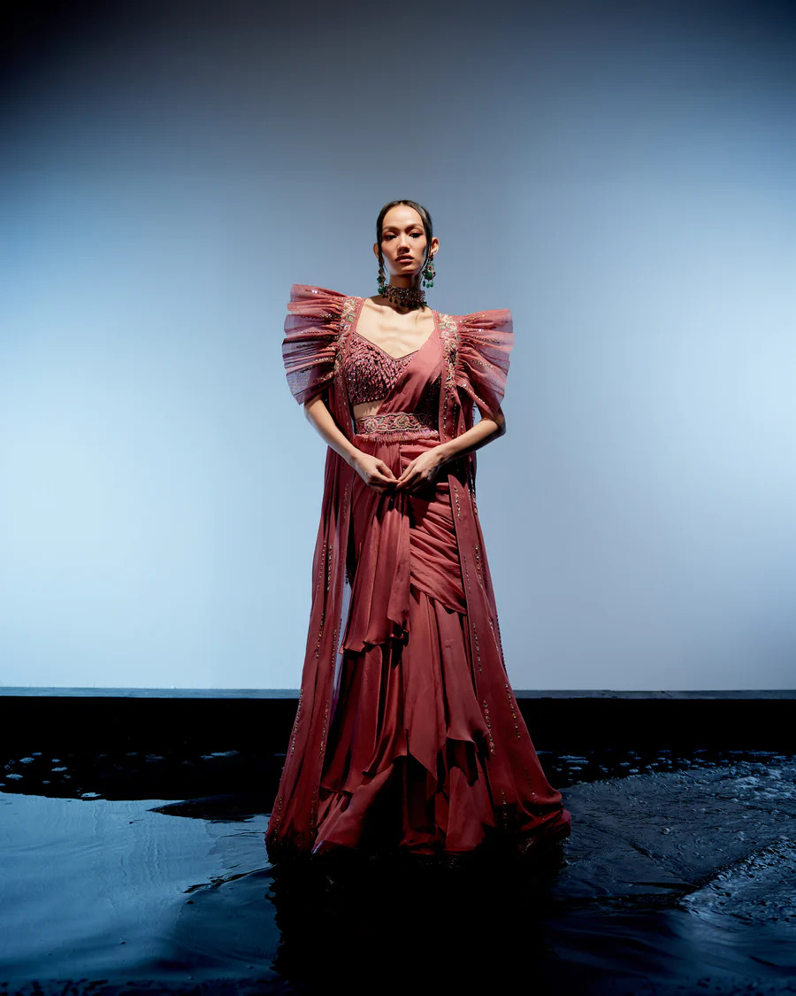 A model showcasing Amara Drape Saree by Miku Kumar from Miku Kumar's collection